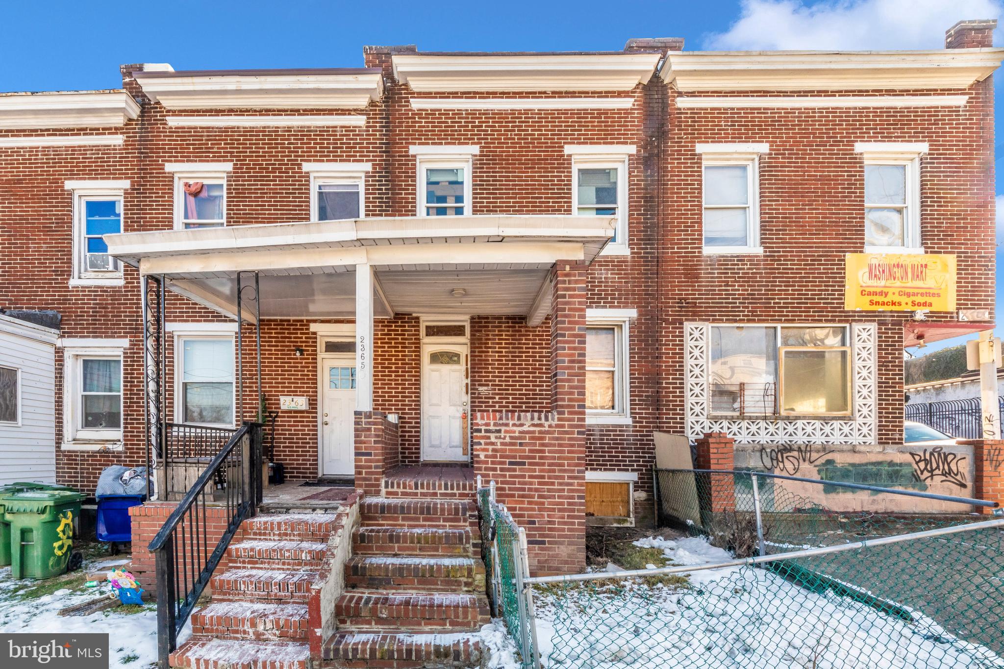 Discover the potential of this charming brick-front rowhome with a covered front porch, ready for your vision and creativity. Featuring original hardwood floors throughout, this home is filled with character and natural light, offering a spacious layout with endless possibilities for updates and renovations. The upper level includes three bedrooms and a full bathroom with a skylight, adding a touch of natural brightness. The bathroom features a tub/shower combo, providing functionality and convenience. The fully fenced backyard is a private retreat with no alley, offering ample space for outdoor activities, gardening, or relaxing. Enjoy stunning skyline views of the entire city right from your backyard—a unique and captivating feature. Conveniently located near I-95, I-295, and the Inner Harbor, this property offers both privacy and accessibility to everything Baltimore has to offer. With some TLC, this home can be transformed into a true gem. Schedule your showing today and explore the possibilities!