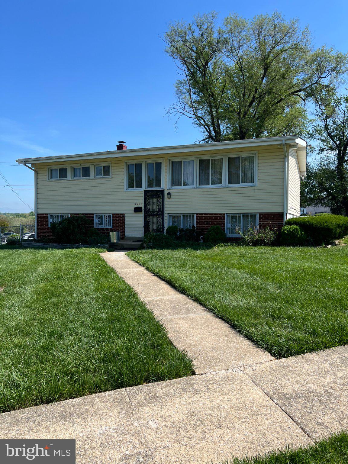 **NEW PRICE, NEW PRICE, NEW PRICE** “Charming corner-lot home with great curb appeal and fenced rear yard.  Many updates through the years by original owner. 3/4 Bedrooms, 2 full baths, Sunroom addition, updated galley kitchen, off street parking  and the original hardwood floors under the carpet. Lower level family with full bath and guest room/den/hobby room. Exterior door leads to the driveway. Large shed on property with electric service.