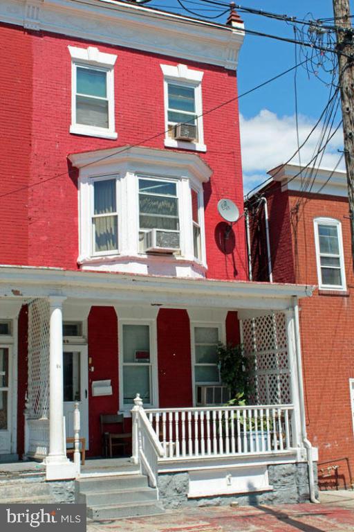 Invest in Happiness! Own this spacious home with unusually deep yard. Purchase as a profitable investment or single family residence. Covered front porch, many rooms, new sewer connection. Newer windows. Low taxes.