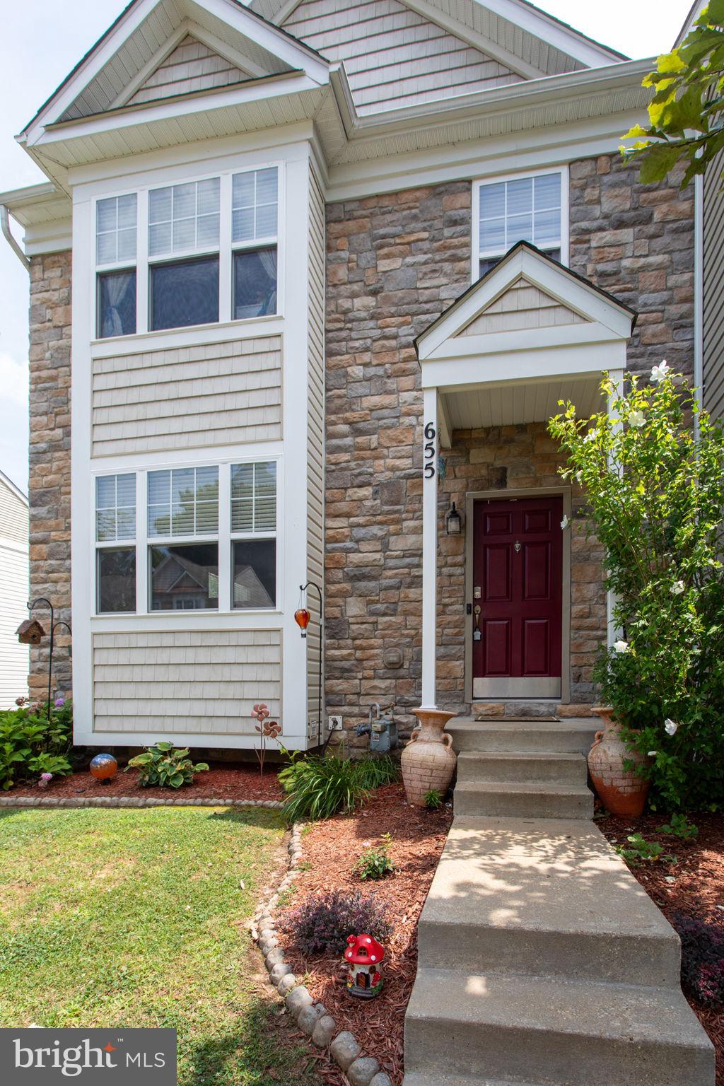 PROFESSIONAL PHOTOS COMING WEDNESDAY 7/22/26.  Welcome home to this exceptional end-unit townhome in the highly desirable Oak Tree Landing community! Boasting over 2,900 square feet of finished living space with bump-outs on all three levels, this is one of the largest floor plans in the neighborhood. A brand-new roof installed in 2024 with a transferable 10-year warranty offers lasting peace of mind, while recently cleaned carpets make this home truly move-in ready.

The bright, open main level showcases stylish luxury vinyl plank flooring, an expansive living room with a cozy fireplace, and a beautifully appointed gourmet kitchen featuring granite countertops, a center island, stainless steel appliances, tile backsplash, a pantry, and abundant cabinet space. The adjoining dining area and sun-filled morning room create the perfect space for everyday living and effortless entertaining, while a convenient powder room completes the main level.

Step outside to the fully fenced backyard where a recently stained deck and a shade sail provide the ideal comfortable setting for relaxing, grilling, or hosting family and friends.

Upstairs, the spacious primary suite offers a peaceful retreat with a vaulted ceiling, two generously sized walk-in closets, and a luxurious en-suite bath complete with a corner soaking tub, separate tiled shower, and dual-sink vanity. Two additional bedrooms and a full bathroom complete the upper level.

The fully finished basement offers incredible versatility with a spacious recreation room, a convenient kitchenette featuring a built-in wet bar and wine refrigerator, a private den or home office that could easily serve as a fourth bedroom, a full bathroom, and a laundry room. Whether you're hosting overnight guests, creating the perfect entertainment space, or working from home, this level adapts to your lifestyle.

Ideally located just minutes from Prince Frederick Town Center, you'll enjoy convenient access to community walking paths and a tot lot, as well as shopping, restaurants, entertainment, CalvertHealth Medical Center, Route 4, and a nearby commuter park-and-ride. Combining generous living space, thoughtful updates, and an unbeatable location, this move-in-ready home truly has it all!