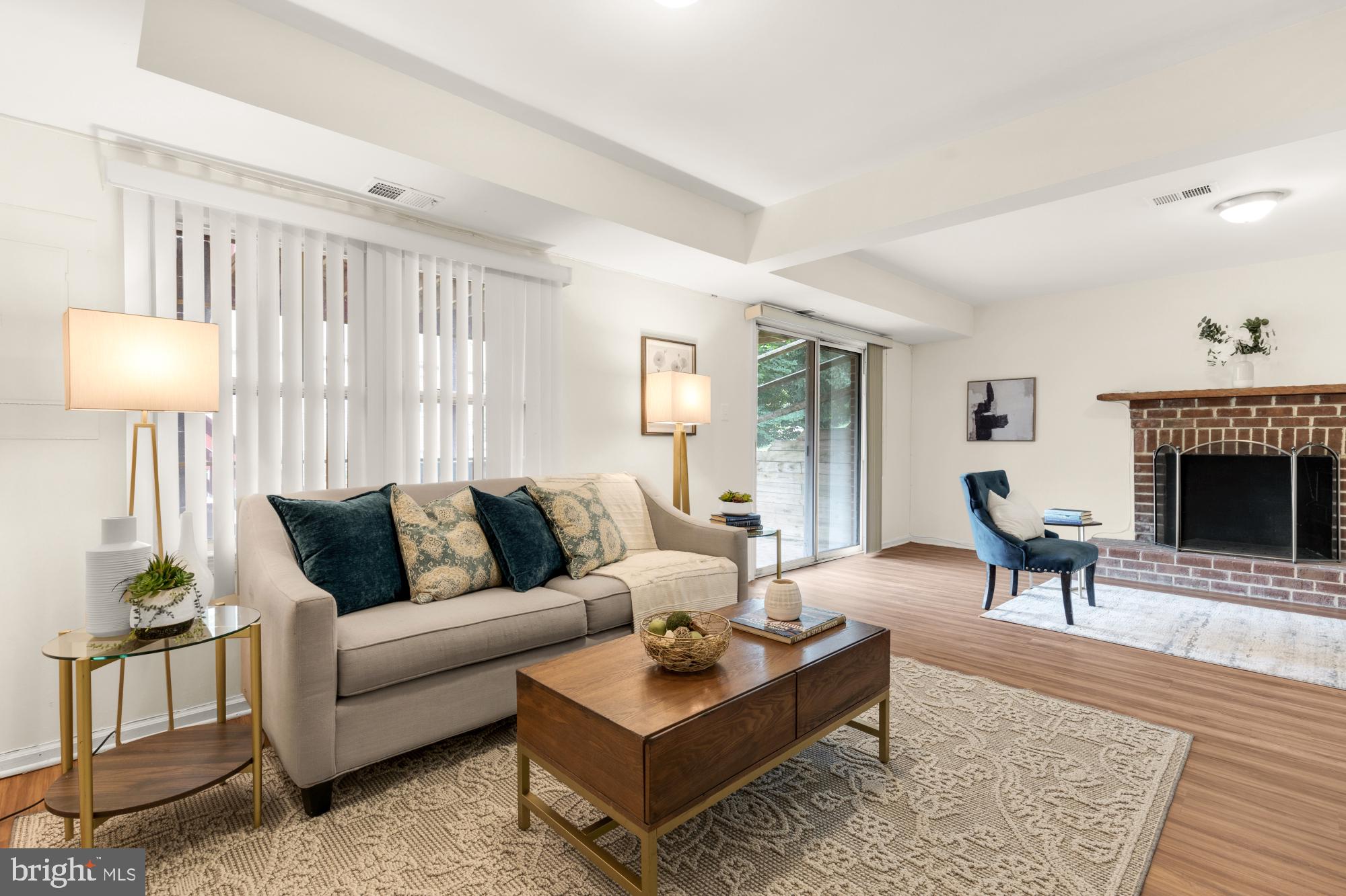 A rare find - Special home w/an open lay-out, light-filled rooms, end unit, great location & no condo fees! Great flow - see the floor plans & the video too!  Sun-filled and oh so spacious! Pretty END unit w/Brick Front & a neutral palate offering: 3 BRS, 2 full BAs, 2 Half BAs, Large Recreation Rm on Lower-Level w/walk out, expansive Deck w/stairs to paver Patio, Laminate Flooring on Main & Lower levels, plush carpeting on BR level, Inviting Breakfast area, Updated Kitchen w/SS appliances, stunning Granite counters, attractive backsplash &  ample cabinetry. Don’t’ miss the generous Laundry Rm w/lots of storage areas. A welcoming Foyer greets you as your tour begins - starting w/the convenient Powder Rm; very functional & updated Kitchen w/recessed lighting & SS sink; Kit has a delightful breakfast area too!  Then, access to the Kitchen from Foyer & also from the separate Dining Rm; enjoy entertaining in the oversized Living Rm w/recessed lighting, plus access to the Deck from Slider. Upper level includes 3 BRs all w/ceiling fans: Primary spacious BR & Primary BA w/shower & walk-in closet; Hall BA w/tub; 2 additional BRs. Lower-Level w/Full daylight Rec Rm, fireplace & level walk out to yard. Convenient 2nd Half BA & spacious LA area off from the Rec Rm. This exceptional home w/generous size rooms offers many updates: NEW ROOF (by Seneca) – 2/2021; Furnace & A/C – 4/2023; SS Fridge/Freezer, Dishwasher, Stove/Oven - 2023; Humidifier - 2023; Main Level Flooring - 2023; Laminate Lower-Level Flooring w/additional waterproofing backing – 6/2025; Ceiling Fan in Rear BR - 7/2025. All this in a sought-after community that is tucked away w/sidewalks & mature trees, yet mins to shopping, dining, parks, theaters, DC, VA, Bethesda, White Flint METRO & bus line. See & be part of the vibrant Pike & Rose location & also enjoy the new nearby Wegmans! What a special home & location. Check out the floor plans and the video too. NO CONDO FEES! 
HOA Fee -covers trash, recycle & common area maint. PICS ONLINE SHOW HOW THE HOME WOULD LOOK WITH FURNTURE.  No longer professionally staged.