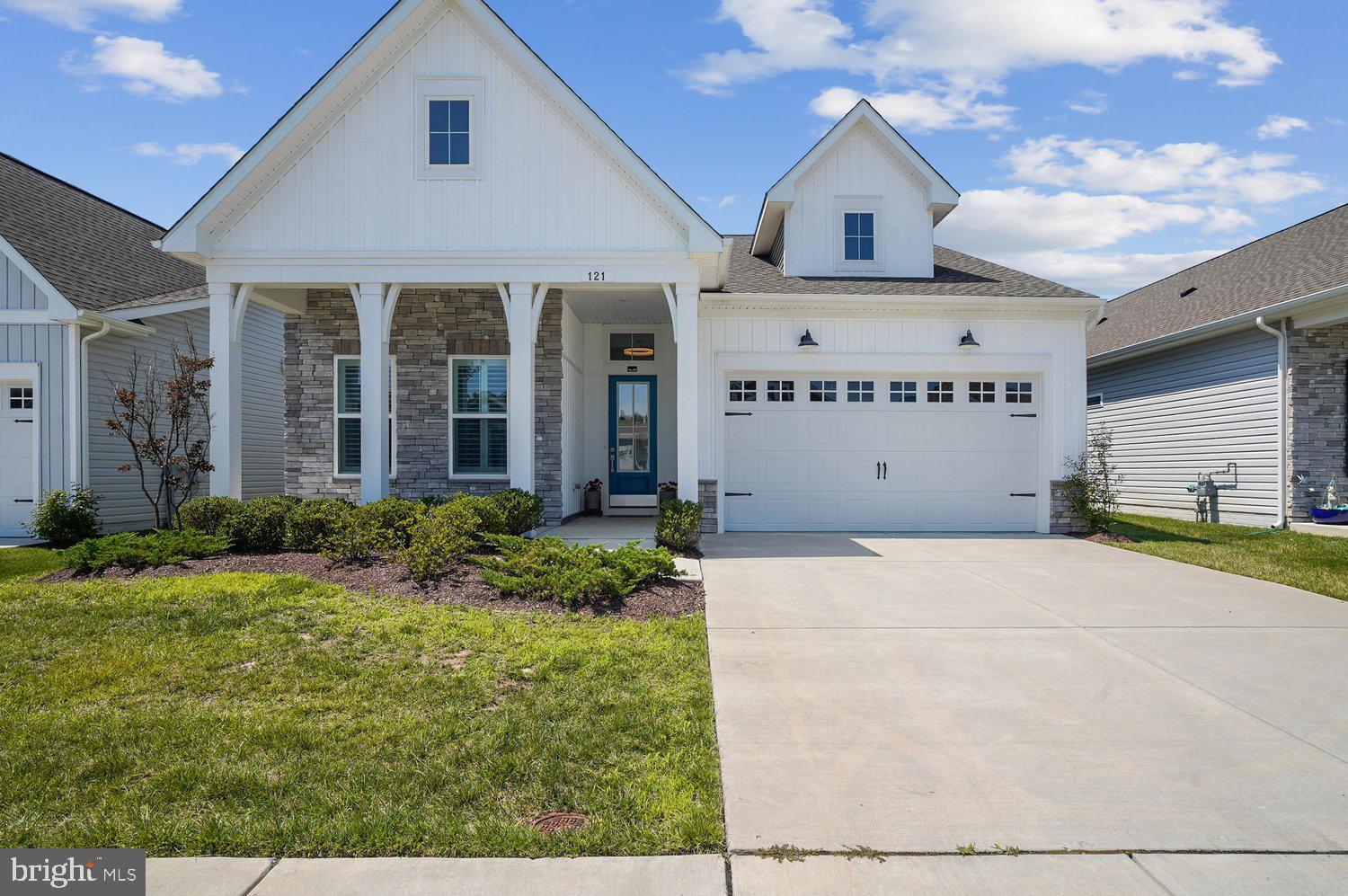 Experience the ease of elegant one-level living in this exceptional home, located in one of Maryland's premier 55+ active adult communities on the Chesapeake Bay.
Designed for both comfort and style, this beautifully appointed residence features a three-car tandem garage with an EV charger, a spacious screened porch, a cozy gas fireplace, upgraded trim and designer feature walls. Thoughtful enhancements include Hunter Douglas plantation shutters, custom California Closets in the owner's suite and second bedroom, ceiling fans throughout, reverse osmosis water filtration, and professionally treated energy-efficient windows that reduce UV rays and heat for year-round comfort.
Beyond your front door, enjoy a true resort-style lifestyle just 45 miles from both Washington, D.C. and Baltimore. The impressive 24,000-square-foot clubhouse offers indoor and outdoor pools, a state-of-the-art fitness center, tennis and pickleball courts, and an active social calendar led by a full-time lifestyle director. From kayaking, yoga, and walking clubs to mahjong, pickleball, and countless social events, there is something for everyone.
Located just steps from the waterfront and minutes from historic Annapolis, this vibrant Kent Island community combines small-town charm with exceptional convenience. Enjoy easy access to Route 50, along with nearby shopping, dining, and everything that makes Chesapeake Bay living so special.