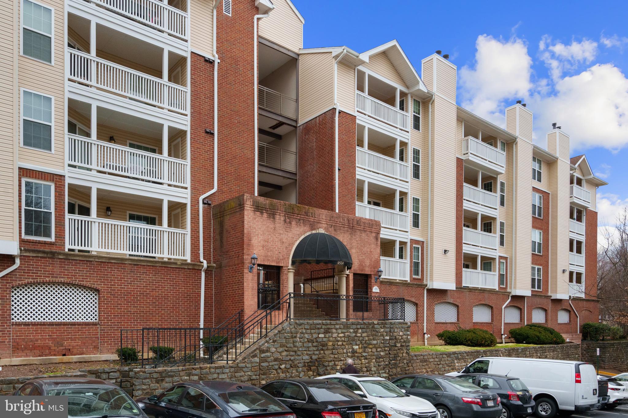 Welcome to this rarely available top-floor 2-bedroom, 2-bathroom condo in the highly sought-after Fountains at McLean community, nestled in the heart of Tysons Corner. This gorgeous home offers an exceptional living experience with vaulted ceilings, wood-style floors, and stunning modern upgrades throughout. The kitchen is a true showstopper, featuring an open design with a picture window cut-out and a counter opening into the living room, creating a bright, airy, and inviting atmosphere. With granite countertops, stainless steel appliances, and ample storage space, it’s a dream for cooking and entertaining.

Not only does this condo offer an exceptional living space, but it’s also perfectly located! Just 2 minutes from Tysons West Park Transit Station, less than 1 mile to Spring Hill Metro Station, and a mere 5 minutes to the Tysons shopping center, you'll be at the center of everything you need. Whether you're stepping out for a cup of coffee at Starbucks, grabbing groceries at Harris Teeter, or shopping at the Tysons Galleria Mall, everything is right at your doorstep. Plus, with Freddie Mac directly across the street, commuting to major employers in Tysons Corner has never been easier.

Inside, the high ceilings and windows flood the home with natural light, making the space feel expansive and bright. Additional perks include an in-unit washer and dryer, walk-in closets, and the added convenience of two assigned parking spaces located side by side.

Living here means enjoying the serene, green surroundings, perfect for outdoor enthusiasts. Whether you’re jogging through the community or just soaking in the beauty of sunrises, sunsets, and the changing seasons, this location has it all. Harris Teeter is steps away, and Whole Foods is just 0.5 miles away in the vibrant Boro shopping and living district.

This home also features hardwood flooring (no carpet), granite /stone countertops in both the kitchen and bathrooms, and a sleek, contemporary design throughout. Relax on one of the spacious balcony, perfect for enjoying a cup of coffee, or simply unwinding. The unit has many updates throughout and the building recently completed a major capital improvement project in July 2020, including new windows, sliding glass doors, siding, paint, and concrete upgrades, ensuring a beautiful and hassle-free living experience.

For those who love to entertain, the BBQ area with tree shade at the back of the building is the ideal spot for hosting gatherings. With one reserved parking space included and a vibrant community packed with amenities such as on-site management, a fitness center, an outdoor pool, clubhouse, and more, this condo offers everything you need for modern living at its finest.

This is a must-see—don’t miss your chance to experience the lifestyle you deserve. Schedule your tour today and make this dream home yours!