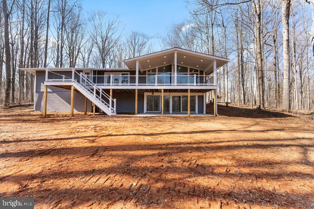 🌿 Modern Retreat on Private Wooded Acres 🏡✨

Escape to tranquility with this stunning, fully renovated home nestled on a private wooded lot with breathtaking views of nature and a serene pond right in your backyard.

💎 Key Features: ✔ 3 Bedrooms | 2.5 Bathrooms – Spacious and modern layout

✔ Gourmet Kitchen – Featuring sleek black granite countertops, white shaker cabinets, stainless steel appliances, and an oversized island perfect for entertaining
✔ Expansive Living Area – Vaulted ceilings, a cozy fireplace, and floor-to-ceiling panoramic windows offering stunning views
✔ Walkout Basement – Featuring a rustic stone fireplace, second living area, and direct access to the outdoors
✔ Massive Deck & Covered Patio – Enjoy outdoor living with a large wraparound deck and covered entertainment space
✔ Attached 2-Car Garage + Detached 2-Car Garage – Plenty of storage for vehicles, tools, or hobbies
✔ 5+ Acres of Pure Privacy – A true retreat with wooded surroundings and a private dock on the pond

This home is a rare find—offering a perfect balance of modern luxury and nature. Whether you’re looking for a peaceful escape or a home designed for entertaining, this one has it all! 🌲🏡✨

📍 Schedule your private tour today!