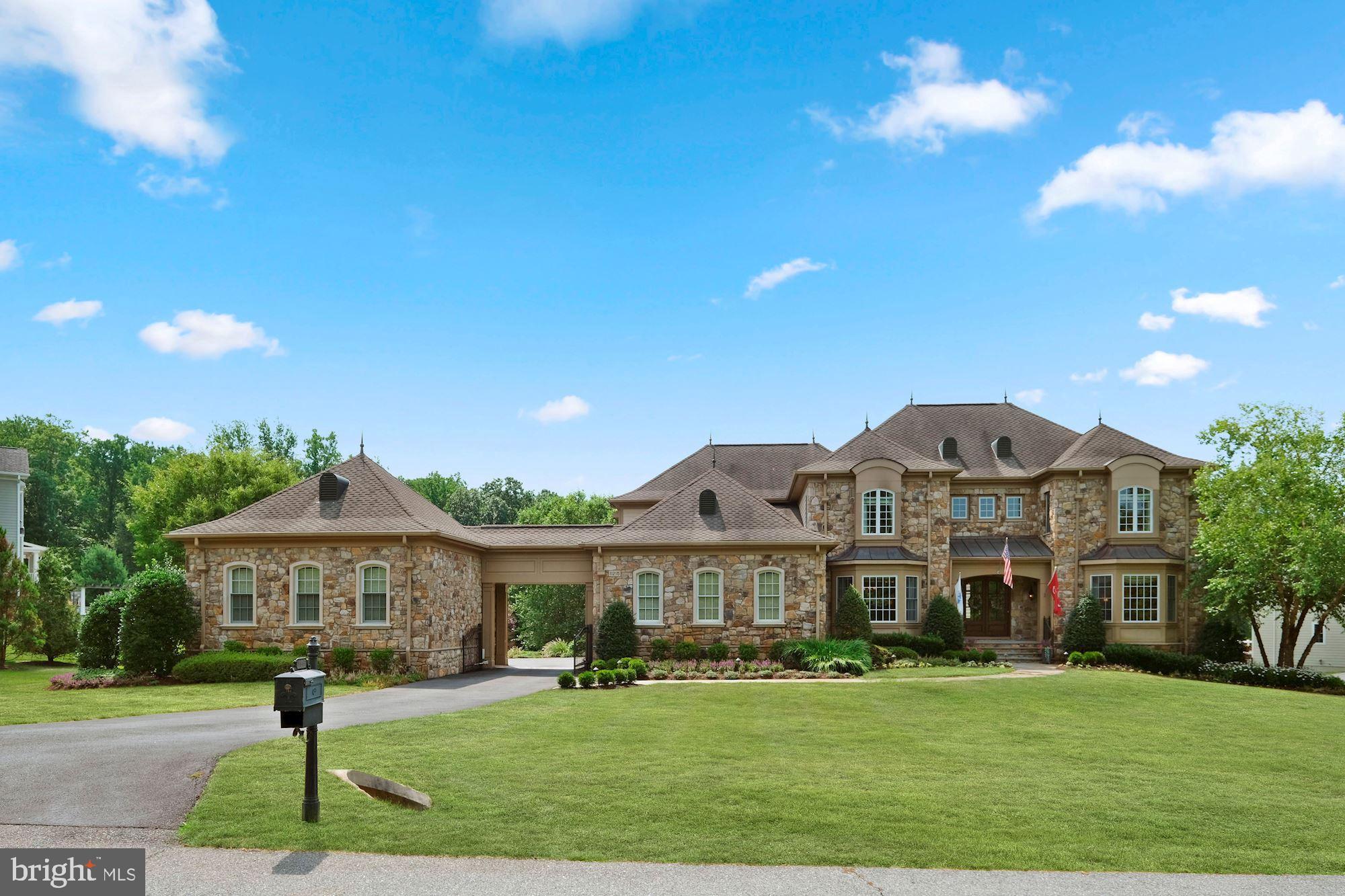 INCREDIBLE VALUE ! Originally built for $2.5M with an additional 500K in improvements, this stunning home would be impossible to replicate for its current listing price!  Experience this  magnificent custom built mediterranean estate with unsurpassed amenities minutes away from the quaint shops and restaurants of historic Ellicott city  and with convenient routes to Washington DC and Baltimore.  You will feel like you stepped into a resort with over 9000 sqft of luxury living that feels comfortable, inviting yet intimate. Meticulously maintained home with lush gardens, hardscape and large outdoor areas await your arrival to this stunning home. The variety of outdoor spaces in resort style setting offer unique places to sit, relax, and entertain your guests. (PLEASE WATCH VIRTUAL VIDEO) The interior features 5 oversized en suite bedrooms and 7 spa like bathrooms,  family room with wood beam ceiling, heated floors and built in speakers in every room,  elaborate moldings and paneling throughout , custom drapery, gourmet kitchen with solid wood custom cabinetry, all Viking appliances, hardwood floors , custom drapery , wood blinds all through the home, two staircases, large theatre room with projector and 135"movie screen, theatre lighting and speakers, exercise room with mirrored walls, pool changing closet and full pool bathroom, motorized screens on decks ,indoor sprinkler system, and smart enabled system to control  the whole house and countless more. The exterior features a fenced custom built in-ground mineral pool with separate hot tub, outdoor speakers, gas fireplace, pergola, dry sitting under deck, outdoor storage closet, custom landscaping and lights, a summer kitchen with built-in Lynx 42"grill, built in refrigerator, granite countertops, ceiling fans, outdoor speakers and mahogany ceiling. 2 attached and 2 detached car garages with gated driveway, garage tex storage system, MyQ link, irrigation system throughout. Complete luxury in an intimate setting , this home will surely provide countless days of joy and relaxation to its new  owners.  Please call today for a personal tour. APPOINTMENT REQUIRED WITH 24 HOUR NOTICE. NO DRIVE-INS PLEASE