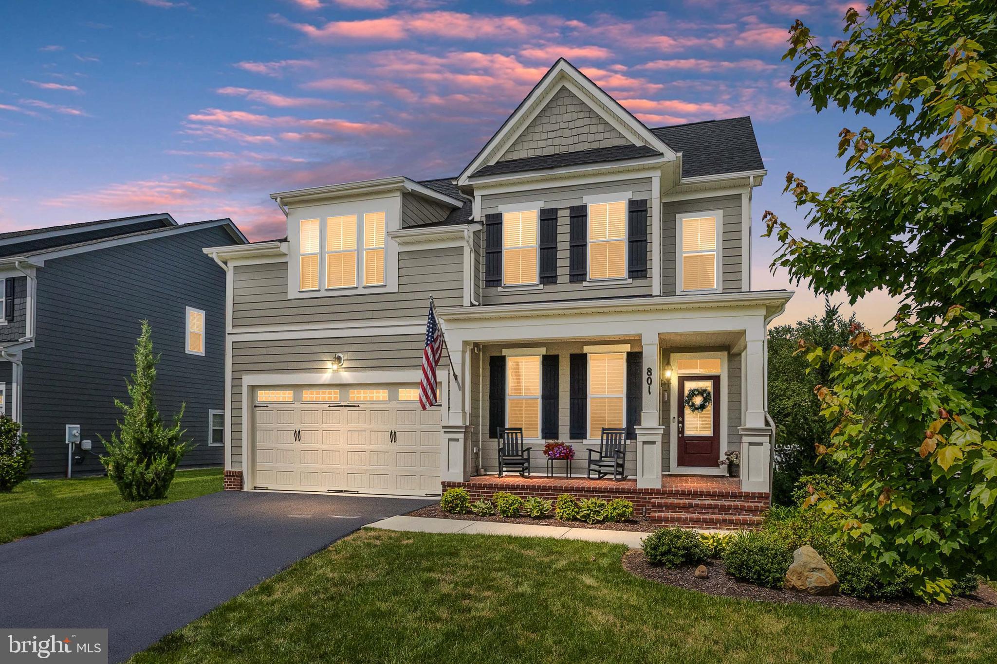 Welcome home to this stunning 4 bedroom, 3.5 bath residence offering the perfect blend of luxury, comfort, and convenience. The spacious primary suite is thoughtfully located on the main level, complemented by an open-concept floor plan, soaring vaulted ceilings, and dramatic two-story ceilings in the family room with an elegant overlook from the upper level. The heart of the home is the gourmet kitchen, featuring an extra long center island, abundant cabinetry, and a massive built-in pantry designed for both everyday living and entertaining. A cozy fireplace anchors the main living area, while the main-level laundry room adds convenience to daily life.

If you are looking for a 5th bedroom, the basement already has the egress window, full bathroom and closet in place. Adding a single wall will give you exactly what you are looking for in terms of added bed space. 

Upstairs, you'll find three generously sized bedrooms and ample living space, while the finished lower level offers a potential fifth bedroom, a full bath, and flexible space for guests, recreation, or a home office. Step outside to enjoy the beautifully designed paver patio overlooking a fully fenced backyard—perfect for relaxing, entertaining, or play.
Ideally situated just moments from the charming towns of Round Hill and Purcellville, you'll enjoy easy access to shopping, dining, parks, wineries, schools, and everyday conveniences, all just seconds from your front door. This exceptional home truly offers the best of Loudoun County living
