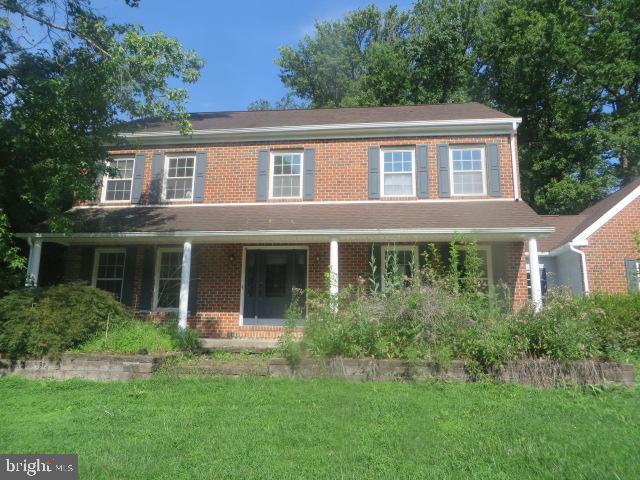 Spacious, 4 bedroom Colonial located in the Woodland Acres section of Garnet Valley. Large, living room, family room with fireplace, powder room, laundry room, rear enclosed porch plus huge space for a brand new kitchen. Second floor features the primary bedroom suite with large bathroom  ready to be finished. Three additional bedrooms with hardwood floors complete the 2nd floor. The finished basement is huge with another powder room and plenty of storage space. Property is located on .75 acres with nice sized rear yard and back patio. Can't beat this price. This one is priced to sell and won't last long!