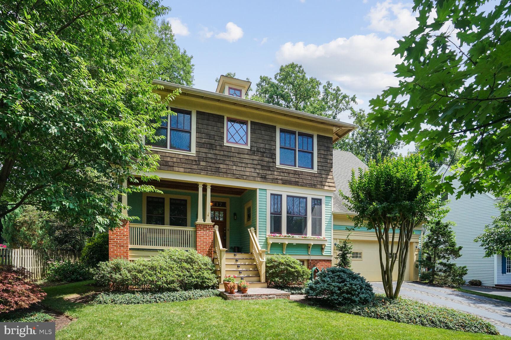 Bukont masterpiece impeccably maintained  by original owners! Top notch design and quality construction abound throughout and all of this  on a professionally landscaped lot,  offering  plenty of privacy.  Fantastic location near the WO&D trails and a short walk to downtown Vienna!  Relaxing front porch offers treed views. Hardwood floors on the main level, arts and craft style light fixtures throughout and a study with built-in bookcases. Living room  with wood burning fireplace and  slate hearth plus French doors to amazing deck. Bonus sunroom off living room filled with light and floor to ceiling windows. Columned built in bookcases separate the living room from the  kitchen. Solid wood cabinets, stainless steel 6 burner Wolf range with arts and crafts Motawi tile backsplash, granite counters with a peninsula island, Asko Stainless dishwasher and wood paneled Sub Zero refrigerator & pantry complete this chef's kitchen. Breakfast nook with space for a 6 person table.  Butler's pantry leads to formal dining room with custom stained glass window. Mud room off garage. Main level powder room and loads of closet space on the first floor.  The upper level features a  hardwood staircase leading to a primary suite with his and her walk in closets and a luxurious bathroom with dual shower heads, double vanity and a soaking tub. Bedroom 2 has  an en suite bathroom and a walk in closet. Bedrooms 3 & 4 share a Jack and Jill bath. Upper level laundry room has shelves for storage as well as a  linen closet. The lower level has a recreation room. half bathroom with rough in and space to add a tub, workroom with a window & closet that can easily be converted into a Bedroom/study!  Huge unfinished space currently being used for storage. Enter your own private oasis as you step on the wood deck off the living room, featuring an amazing lattice wall of greenery offering total privacy. Home backs to mature trees and beautifully manicured gardens with a winding stone path to the front yard. The  yard with  dogwoods, azaleas, lilacs, and cherry trees is  one you are sure to fall in love with! Easy access to Metro, 66, & Tysons.