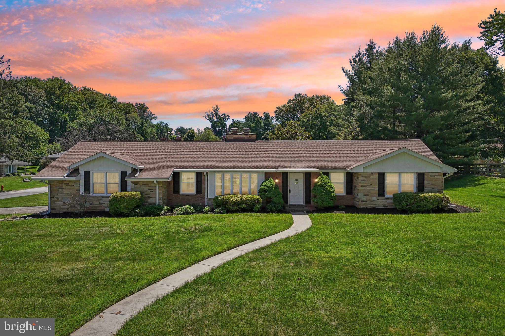 Welcome to the Westerlee neighborhood, where this classic Catonsville gem sits on a beautifully landscaped corner lot of nearly half an acre. From the moment you arrive, the mature trees and thoughtfully maintained grounds set the tone for everything this home has to offer.

Inside, you will find character and comfort in every room. Two stone fireplaces anchor the living spaces with a timeless appeal, while exposed beamed ceilings, built-ins, and wood wall accents give the home a richness that newer construction simply can't replicate. The open floor plan flows naturally from the living and dining areas into a stunning year-round sunroom - fully glassed and perfectly suited for morning coffee, evening relaxation, or entertaining at any season.

This one-level lifestyle is exactly what buyers are looking for adding flexibility for guests or aging-in-place needs.  

The kitchen has been updated with gray shaker cabinets, tile backsplash, stainless steel appliances including a gas range and French door refrigerator, and a sunny window overlooking the back lawn. The adjacent laundry room with full-size washer and dryer adds convenience you'll use every day, along with a side door to the exterior.

The 2-car garage provides excellent storage and convenient access, while the generous lot offers privacy and room to breathe - a true rarity in this price range.

Location is everything here: minutes to Rt. 40, I-695, I-70, and BWI Airport, with all the dining, shopping, and community character that makes Catonsville one of Baltimore County's most sought-after communities.

This home checks every box - space, character, location, and a lot that will make your neighbors envious. Come see it before it's gone.