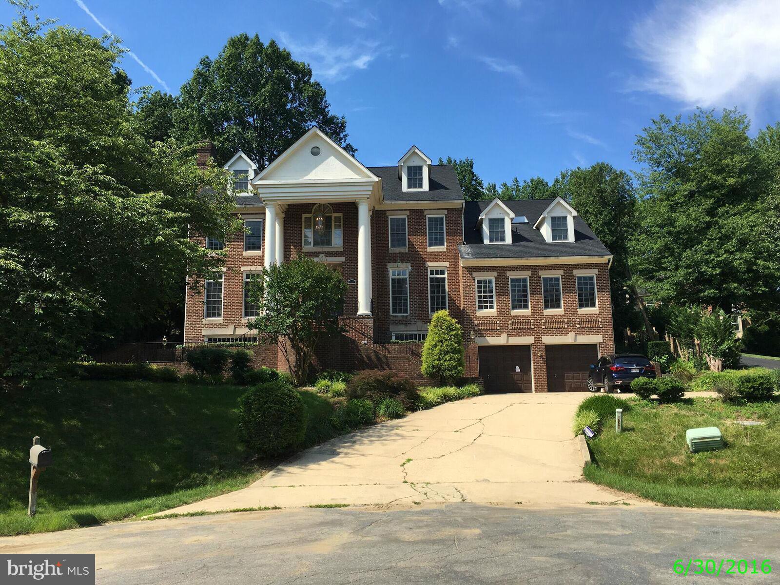 Outstanding opportunity to return this stately, 4 lvl all-brick colonial to its full potential. Nearly 10k sqft of luxury amenities including 4 fireplaces, 2 wet bars, wood paneled study, gourmet kitchen, skylights, balcony, elevator, pool, wine cellar, brick terrace & an incredible MBR w/ loft & marble BA. Comfortable casual & formal spaces w/ limitless entertaining options. Cul-de-sac location.