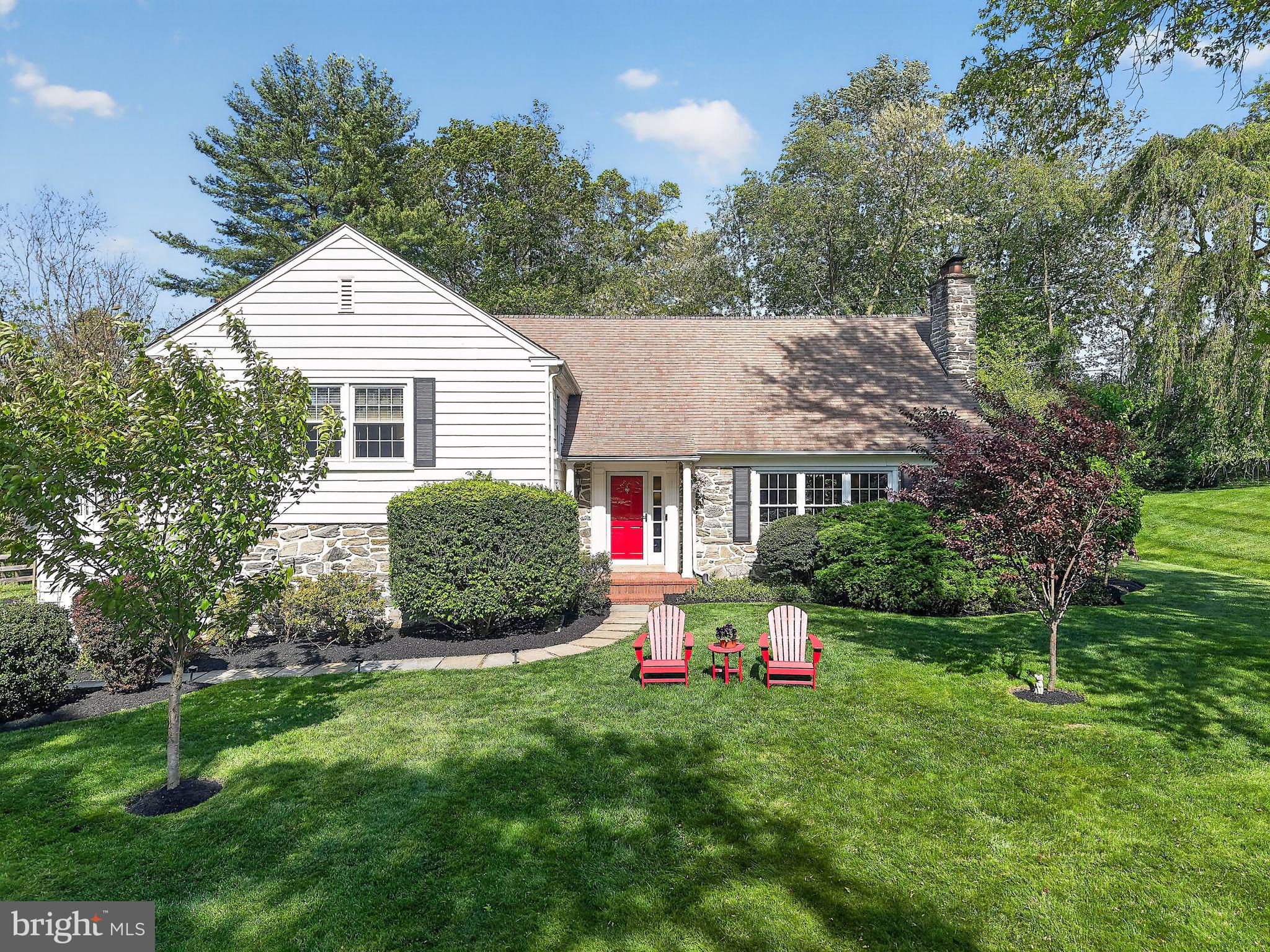 Nestled along a scenic loop in Wayne’s sought-after Deepdale community, this
updated and expanded home is one of the largest models in the neighborhood!
From the newly resealed driveway, a flagstone path leads to the columned front
porch with distinctive door. Inside, unobstructed sightlines bring the private,
beautifully landscaped backyard into focus, while fresh neutral paint, gleaming oak
floors, custom moldings and bespoke built-ins create a warm, stylish feel
throughout. Just off the foyer, the bright and spacious living room features a
marble fireplace flanked by custom built-ins and a large picture window
showcasing the lush front yard. The adjoining dining room boasts a bay window,
classic chair rail and convenient pocket-door access to the kitchen. The eat-in
kitchen offers thoughtful upgrades like granite countertops, stainless steel
appliances, abundant cabinetry and peninsula seating for four, all opening to a
stunning breakfast room with vaulted ceiling and dramatic floor-to-ceiling window
overlooking the backyard. French doors open to the rear deck for seamless indoor-
outdoor living. A few steps down from the entry hall, the lower level includes a
cozy family room with new hardwood flooring and California Closets® built-ins, plus a
powder room, mudroom and direct access to both the oversized two-car garage and
a rear brick patio. Upstairs you’ll find two secondary bedrooms, a full hallway bath
and a primary suite with  updated ensuite full bath and spacious side
porch. A short flight of stairs leads to the fourth and fifth bedrooms, which share a
full hall bath with new shower and lighting. The partially finished basement adds
valuable flex space for a playroom, lounge or home gym, with room for laundry,
storage and a nearly new HVAC system. Outside enjoy a tiered deck and fenced
yard with expansive greenspace to run and play. Zoned for top-ranked Tredyffrin-
Easttown School District, this exceptional home is in the heart of Deepdale, a
beloved community known for its strong neighborhood association and family-
friendly events and traditions. Residents enjoy convenient access to downtown
Wayne, major commuter routes and regional rail, plus a short walk to Tredyffrin
Library and Strafford Park’s playgrounds, basketball and tennis courts. Don’t miss
your chance to experience the ideal blend of neighborhood charm, everyday
convenience and spacious living in one of Wayne’s most desirable communities!