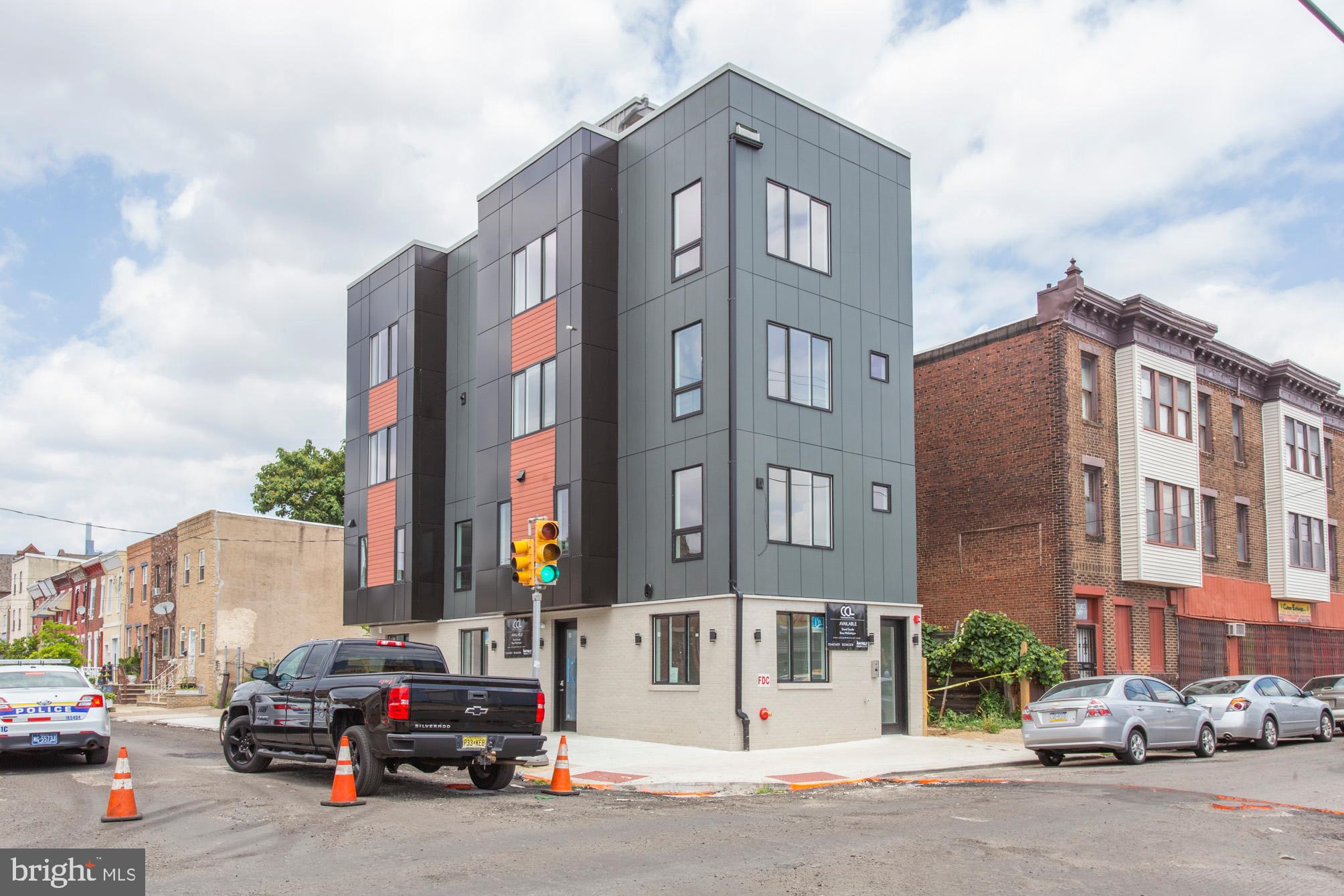 Exceptional mixed-use triplex opportunity in the heart of rapidly developing Point Breeze! This newer construction, turnkey property offers the perfect blend of strong cash flow, modern design, and long-term upside with the majority of the tax abatement still remaining. The building features three bi-level units consisting of two spacious residential apartments and one commercial space, all thoughtfully designed with high-end, low-maintenance finishes. The approximately 1,100 SF commercial unit includes its own private restroom and the rare bonus of 1 oversized car parking. The two upper residential units each offer 3 bedrooms, 2 full bathrooms, roof decks, bi-level layouts, full-size in-unit washer/dryers, and beautifully designed kitchens with stainless steel appliances and ample cabinet storage. Additional highlights throughout include separated utilities for all units, multi-position adjustable blinds, combo deadbolt entry systems, abundant outlet placement for today’s modern needs, and energy-efficient systems designed for convenience and reduced maintenance. The property has consistently remained occupied with leases often renewing year after year, making this an ideal opportunity for an investor seeking dependable income with future upside as the neighborhood continues to grow. Perfect for an investor, owner-occupant, or entrepreneur looking to live or operate a business on-site while generating additional income. Conveniently located near Center City, restaurants, coffee shops, retail, and major transportation routes, this is a rare opportunity to own a modern mixed-use asset in one of Philadelphia’s fastest-growing neighborhoods. This gem will not last!