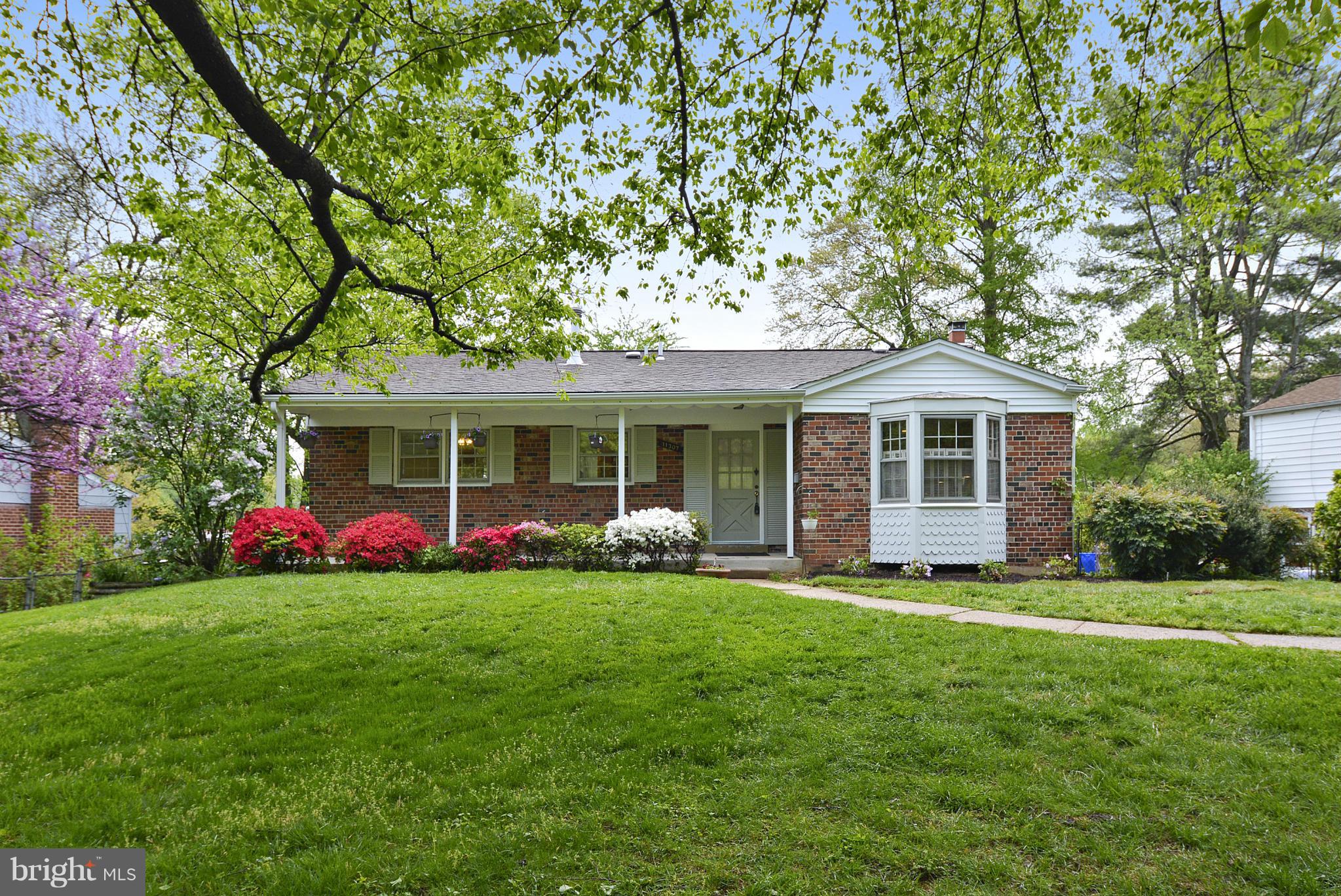 Updtd, sun-filled brick Ramblr-4BR, 3 remdld FB, lg liv rm, kit w/updtd apps-corian cntrs, bkfst area w/bay window,   freshly painted, refnshd hrdwd flrs. Walk-out Lwr lvl incl rec rm w/FP, wet bar, BR, FB, & laundry rm. Sunrm off the back & lrg bkyrd, drvwy/off st prking. Close to schools, shops, restaurants, Metro & Marc. Offers due Noon Wed 4/26.