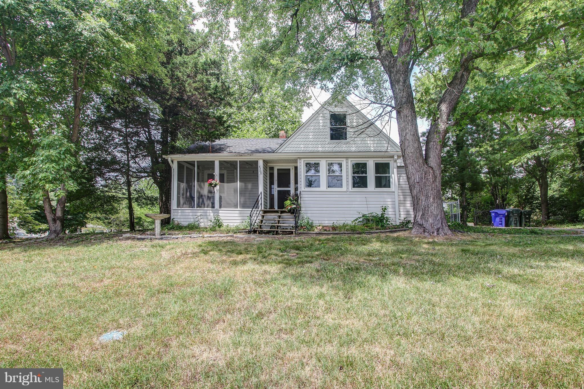 Charming home located on corner lot! Freshly painted & new carpet through out. Vinyl exterior w/ vinyl windows. Enjoy screened in front porch. Large eat in kitchen. Two bedrooms on mail level. One bedroom has sitting area w/ hardwood floors!! Upper level has two rooms. Great location close to 495 and UM! Whole house fan and storage shed AS IS HVAC (2016), Water Heater (2014) New sump pump (2018)