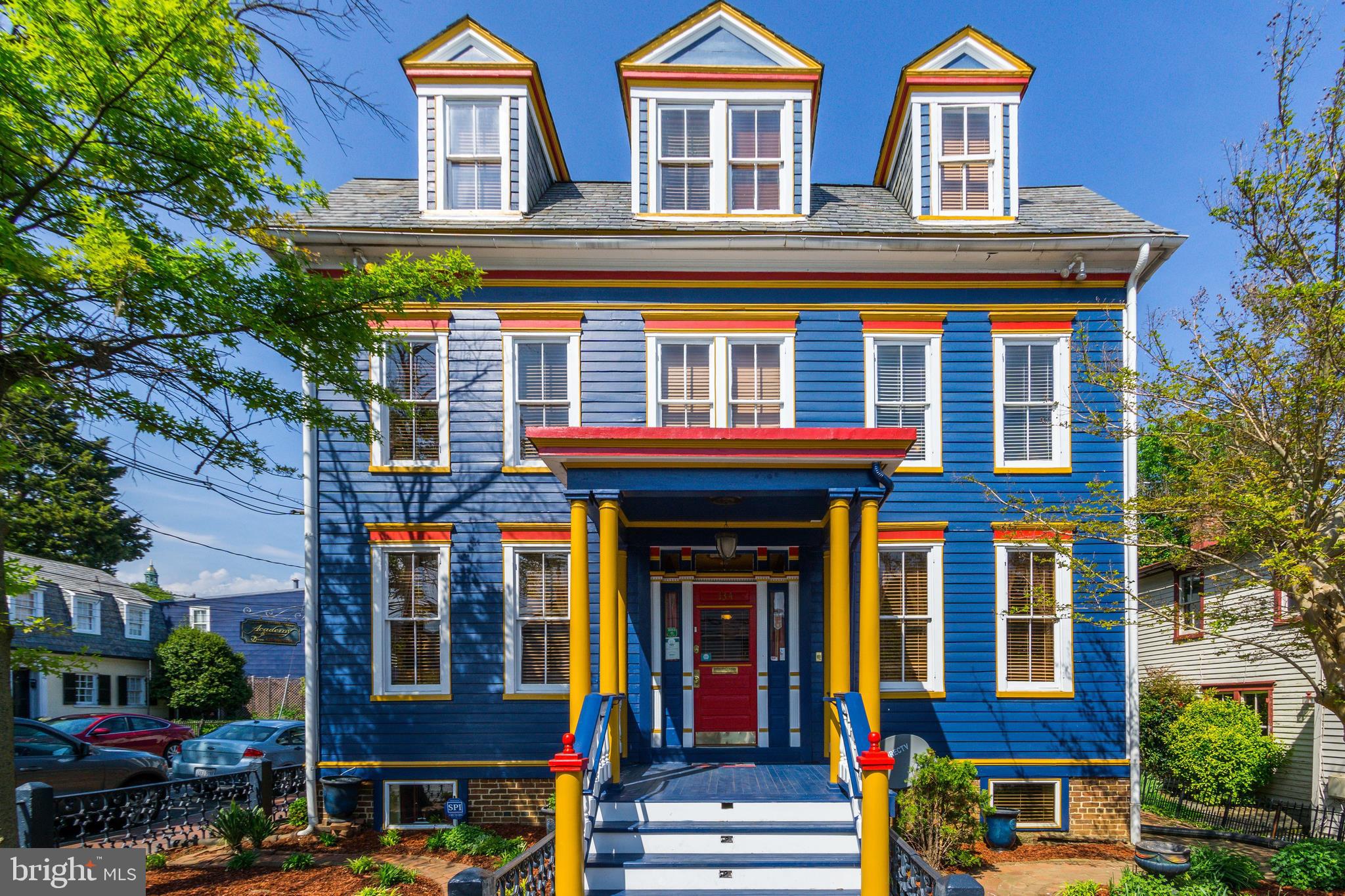 Operate a lucrative, established Bed & Breakfast or Airbnb exuding charm, history, parking & location just steps from the Naval Academy, City Dock, shops, restaurants and all that downtown Annapolis has to offer. Academy Bed & Breakfast includes 4 elegantly appointed en-suite bedrooms complete with steam showers, jacuzzi tubs, wall mounted TV's, refrigerators, wifi access & zoned climate control plus a 2 bedroom English basement apartment for an owner operator. Main level features 9' ceilings and gracious sized public areas for entertaining complete with beautiful formal furnishings. Elaborate, carved period trim & moldings plus original hardwood floors, stairs, railings & banisters throughout. 3 working gas log fireplaces with ornate wood mantles and tile hearths & surrounds. Radiant heated floors in the spacious commercial kitchen and 2 upper level bathrooms. Electrical roughed in for whole house generator. Safety features include whole house sprinkler system, smoke/carbon monoxide detectors & escape ladders in each upper level bedroom. Winding brick walkways surround formal gardens. Original wrought iron fencing was salvaged from the Naval Academy. And, last but not least, gated off street parking for 2-3 vehicles plus a single car detached garage.