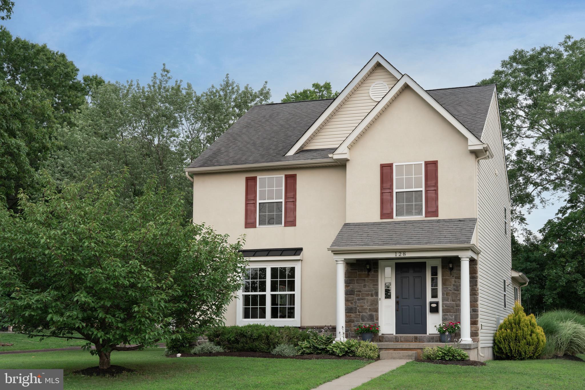 Welcome to this immaculate, move-in-ready Souderton Borough gem, ideally situated in the highly regarded Souderton Area School District. Filled with natural light and finished in soft, neutral tones, this beautifully maintained home offers a flexible, functional floor plan with hardwood flooring throughout much of the first and second levels.
A welcoming foyer with a coat closet opens to a spacious living room and adjoining dining room, creating an easy flow for everyday living and entertaining. The recently updated kitchen features white cabinetry with pull-out storage, a lazy Susan, new hardware, tile backsplash, granite countertops, dishwasher, garbage disposal, and a center island. A brand-new wall of cabinetry provides exceptional additional storage, a pull-out appliance garage, and generous granite workspace. The attached two-car, side-entry garage includes electric openers, direct access to the kitchen, and a separate door to the backyard. A powder room is located just off the center hallway.
Beyond the kitchen, a versatile bonus room is ideal for a home office, playroom, den, or sitting room and opens to the large, private backyard. The brick-paver patio provides a wonderful setting for outdoor entertaining, gardening, or simply relaxing.
Upstairs, hardwood flooring continues throughout the hallway and all three bedrooms. The spacious primary suite features a walk-in closet and a private bath with a soaking tub, separate porcelain-tile shower, ceramic-tile flooring, and a double-sink vanity. A second full bath serves the additional bedrooms, while laundry hookups are thoughtfully located in a hallway closet.
The finished basement provides even more flexible living space, including a family or media room and a separate room currently used as a fourth bedroom that could also serve as a second office or exercise room. An unfinished area offers valuable storage, along with hookups for an additional laundry area.
Enjoy the charm and convenience of downtown Souderton from this highly desirable location. Walk to Main Street, local restaurants, shops, Starbucks, grocery stores, the community pool, and nearby parks. Popular community events, including Third Fridays during the summer months, bring live music, food, local vendors, and wonderful small-town energy to the neighborhood. Combining beautiful finishes, abundant natural light, comfortable living spaces, and exceptional walkability, this pristine home is truly a special place to call home.