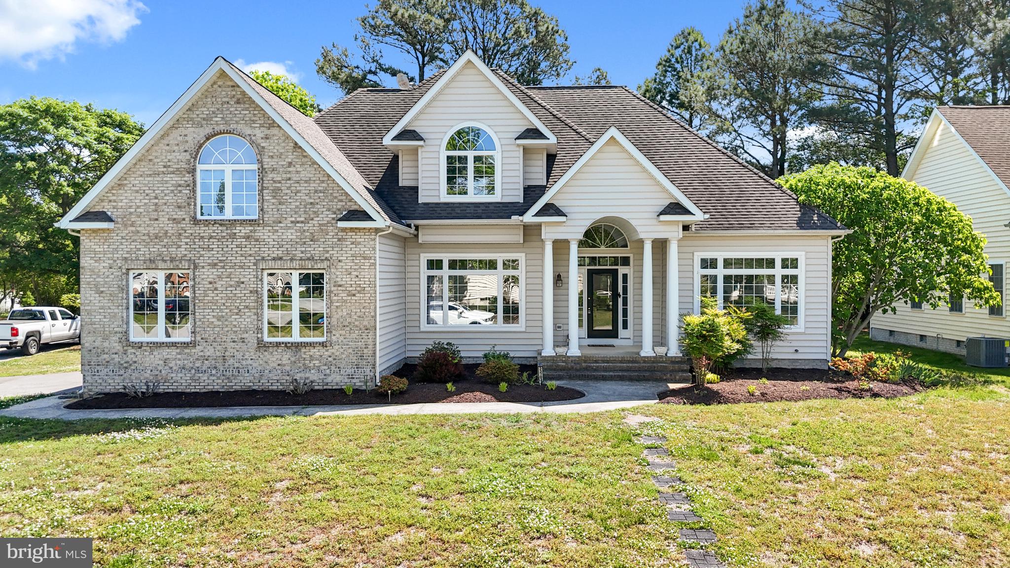Welcome to Frankford, Delaware! Just three miles from Bethany Beach, this beautifully renovated 5-bedroom, 4-bath home offers an incredible opportunity to enjoy coastal living with plenty of room to spread out. Completely renovated from top to bottom, this home combines modern updates with space and functionality. Featuring new flooring, new carpet, and numerous improvements throughout, you'll appreciate the fresh, move-in ready feel from the moment you step inside. Thoughtfully designed living areas include a spacious living room with a cozy fireplace for those rainy or cool days. The primary suite is conveniently located on the main level and features a private ensuite bath with a soaking tub, creating a comfortable retreat at the end of the day. Just minutes from Bethany Beach, shopping, dining, golf courses, and local attractions, this property offers the perfect blend of convenience and coastal charm. Whether you're searching for a primary residence or second home, this move-in ready property is ready for its next owner.