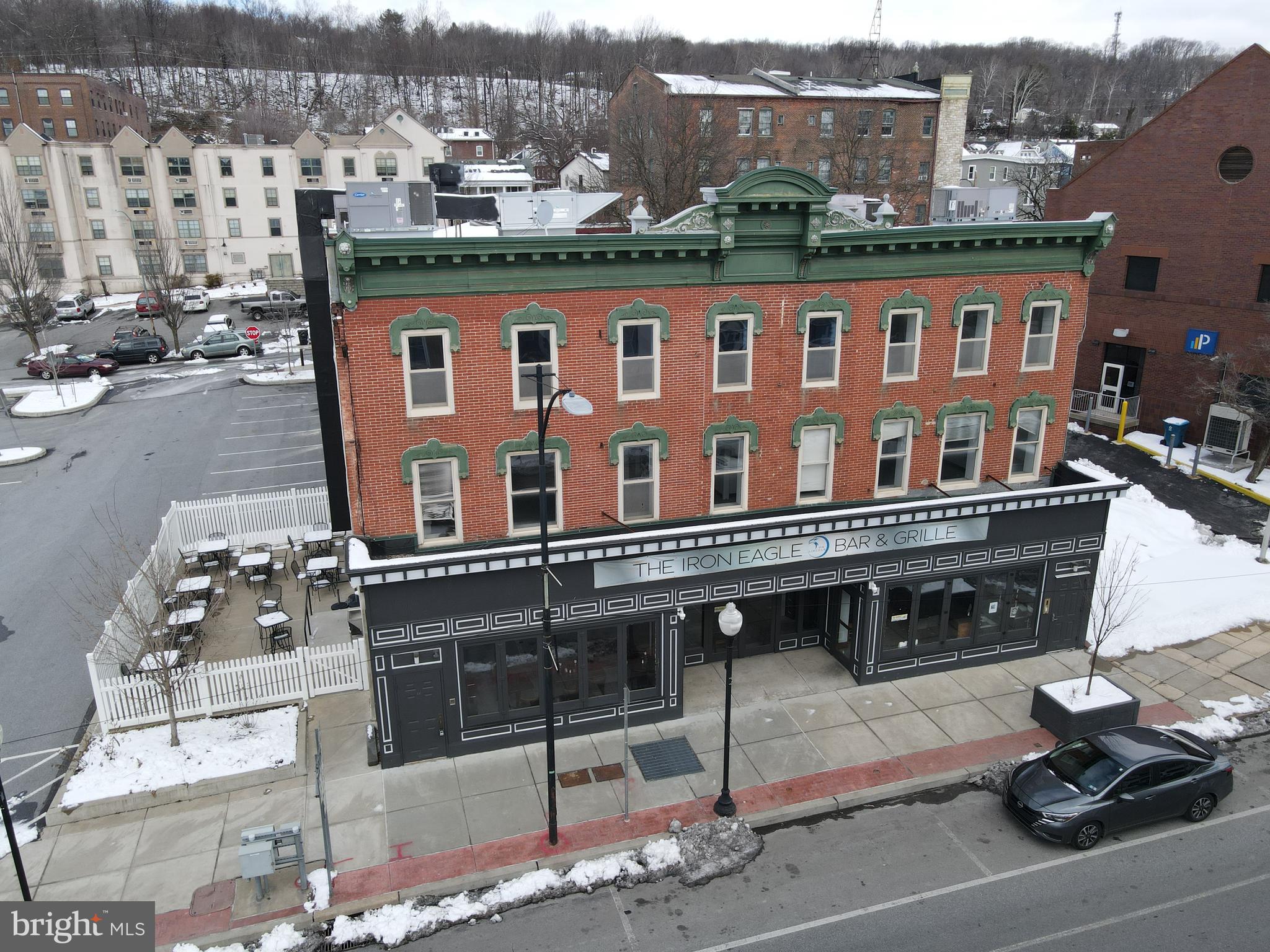 Located at the heart of Coatesville’s downtown revitalization, 213 E Lincoln Highway, is a prime commercial property offering high visibility and a versatile floor plan. Whether you are looking to launch a flagship restaurant, create a unique event venue, or establish a mixed-use commercial hub, this property is positioned to capitalize on the city's significant economic growth. This includes a high traffic storefront on Lincoln Highway/ Business Route 30 as well as growing pedestrian traffic throughout the city. The building , previously home to the Iron Eagle Restaurant, includes an established kitchen and economic liquor license. Throughout the +/- 17,000SF is a two story theater as well as space for possible event hosting, comedy, plays, live music, ect. Additional space on the 2nd and 3rd floors could accommodate, office, apartments, or bar/lounge. Now actively providing tours, reach out today. Available to lease or sale.