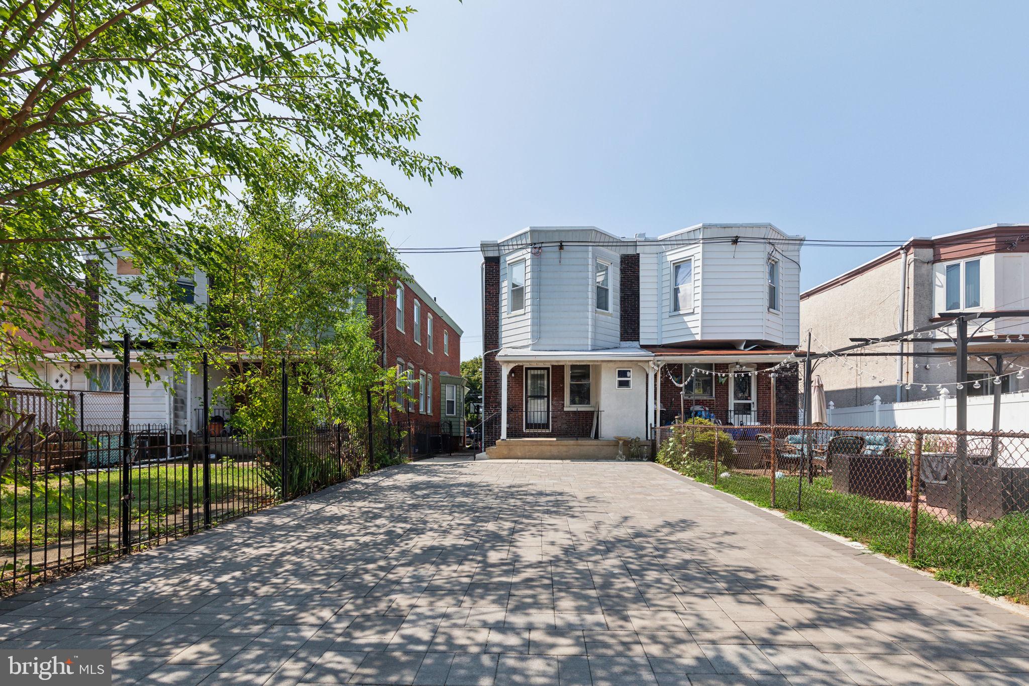 Here is your chance to own a rarely offered, street to street, historical twin,  in the highly coveted Girard Estates with parking for up to four vehicles.  Once you enter, you will be greeted with ample open space for living, dining,  and entertaining. The kitchen features a peninsula for casual eats and functionality, all stainless steel appliances, plenty of cabinetry and space for Chef and crew. The half bath is conveniently located next to the back door entry for easy guest and personal access. Down the stairs, you will have a fully finished basement for whatever you can imagine. The mechanicals are located in the back, then you have the washer and dryer up front. On the 2nd floor, you have 2 standard bedrooms, a hallway bathroom, and a primary bedroom that has it's own bathroom and its own HVAC system. Yes, that's right, dual HVAC systems.  The pictures speak for themselves. Schedule a showing today!