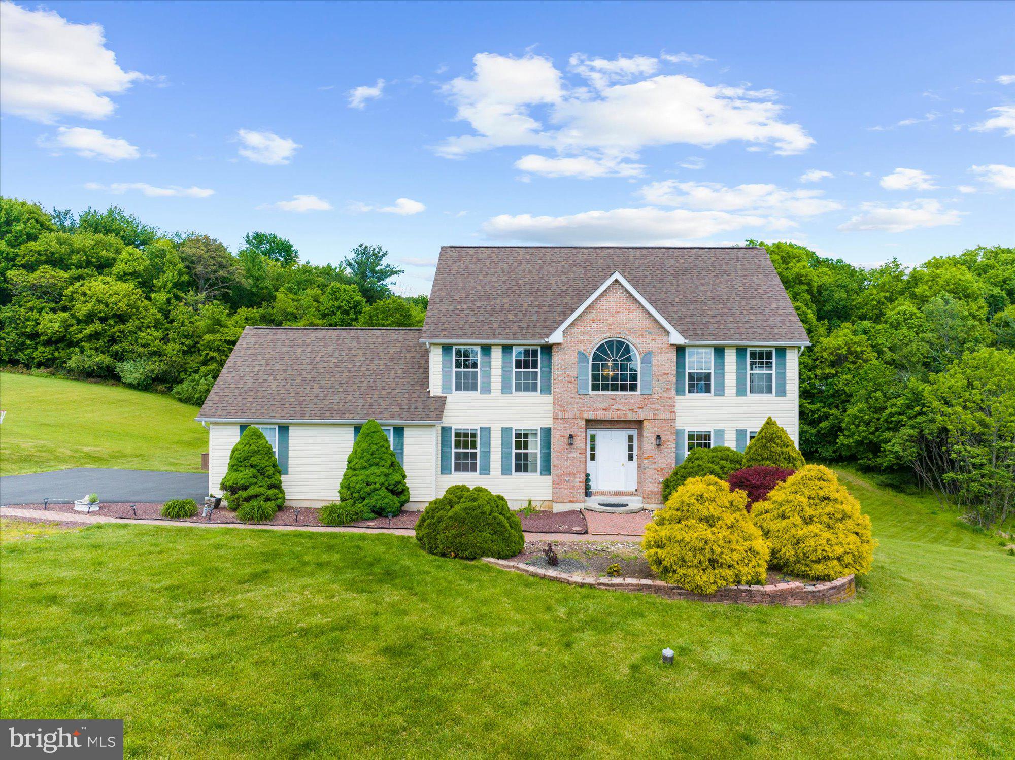 Welcome to 207 Stacia Way — a beautiful 4 bedroom, 2.5 bath home tucked away in the peaceful countryside of Saylorsburg, where scenic surroundings and everyday comfort come together perfectly. Set against the backdrop of the Pocono foothills, this inviting property offers the ideal blend of privacy, natural beauty, and convenient access to local amenities.

Inside, warm and welcoming living spaces provide room to relax, gather, and entertain with ease. The thoughtfully designed layout offers comfortable everyday living while creating the perfect setting for hosting family and friends. Natural light fills the home, adding to the bright and airy atmosphere throughout.

Step outside and enjoy the idyllic country setting, where quiet mornings, fresh air, and picturesque views become part of daily life. Whether enjoying time on the property, entertaining outdoors, or simply taking in the peaceful surroundings, this home captures the charm of rural Pennsylvania living.

Located near local parks, hiking trails, lakes, and year-round outdoor recreation, the area is perfect for those who appreciate nature and an active lifestyle. Residents enjoy convenient access to nearby shopping, dining, and commuter routes while still embracing the tranquility of country living.

The home is also served by local area schools, adding to the appeal of this desirable Monroe County location.