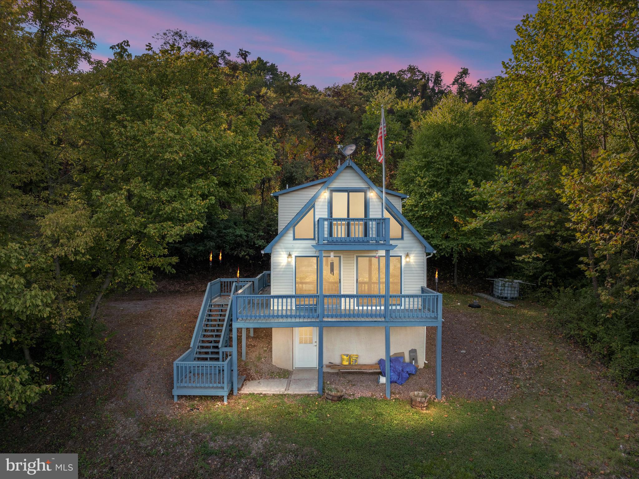 Escape to this Charming 2BR, 1BA Cabin perched atop a serene mountaintop! With an open floorplan, deck, balcony, and a finished basement for extra living space, this retreat is perfect for unwinding after a day of outdoor adventures. Nestled on over 5 private wooded acres, you’ll find ample opportunities for hunting and exploring the natural beauty around you. Enjoy breathtaking panoramic views that make this property a true gem for nature lovers and outdoor enthusiasts alike. Your perfect mountain getaway awaits!