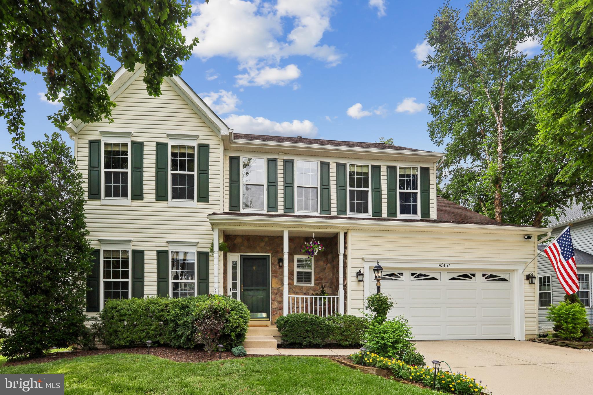 COMING SOON! Open House Sat 7/11 NEW TIME of 11-1 and Sun 7/12 2 - 4PM. Will go live 7/9.  Original owners have lovingly maintained and cared for this 5BR, 3.5BA, 2 car garage home with finished basement & front porch with stone facade. Enjoy the outdoors in your private backyard: a putting green, stadium stairs to the large patio, newly shingled shed, a vegetable garden, koi pond, and an inviting walking path around the trees and perennials on the .22AC lot! Pride of ownership abounds throughout.  An updated kitchen with tile backsplash, quartz counters, SS appliances, updated lighting, an island with shiplap end caps and new HDWD floor. The neutral palette is carried throughout. New carpet in the family room with gas fireplace is adjacent to the kitchen for open living. A breakfast nook with a newer sliding glass door to the backyard adds natural light.  The living and dining rooms create the left wing of the main level with a bay window in the dining room. Upstairs the spacious primary bedroom with cathedral ceiling offers a walk-in closet and spacious luxury bath with soaking tub and separate shower with new shower enclosure, plus double sinks. Three ancillary bedrooms, a full bath and the laundry room finish this level. On the lower level, a legal 5th BR, full bath, kitchenette and ample sized rec room add to the finished living space. Beautiful landscaping with 4 season interest delights the eye and provides great curb appeal.