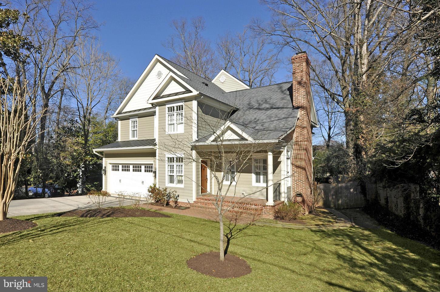 Wonderful Craftsman Style residence in very close-in McLean! This home features hardwood floors throughout the main & upper floors, 9' ceilings, gourmet kitchen, large family room w/ fireplace, wonderful master suite w/ sitting room & dual walk-in closets, walkout lower level featuring rec room w/ stunning bar & theater room. The backyard offers a large deck & yard. 2-car garage.