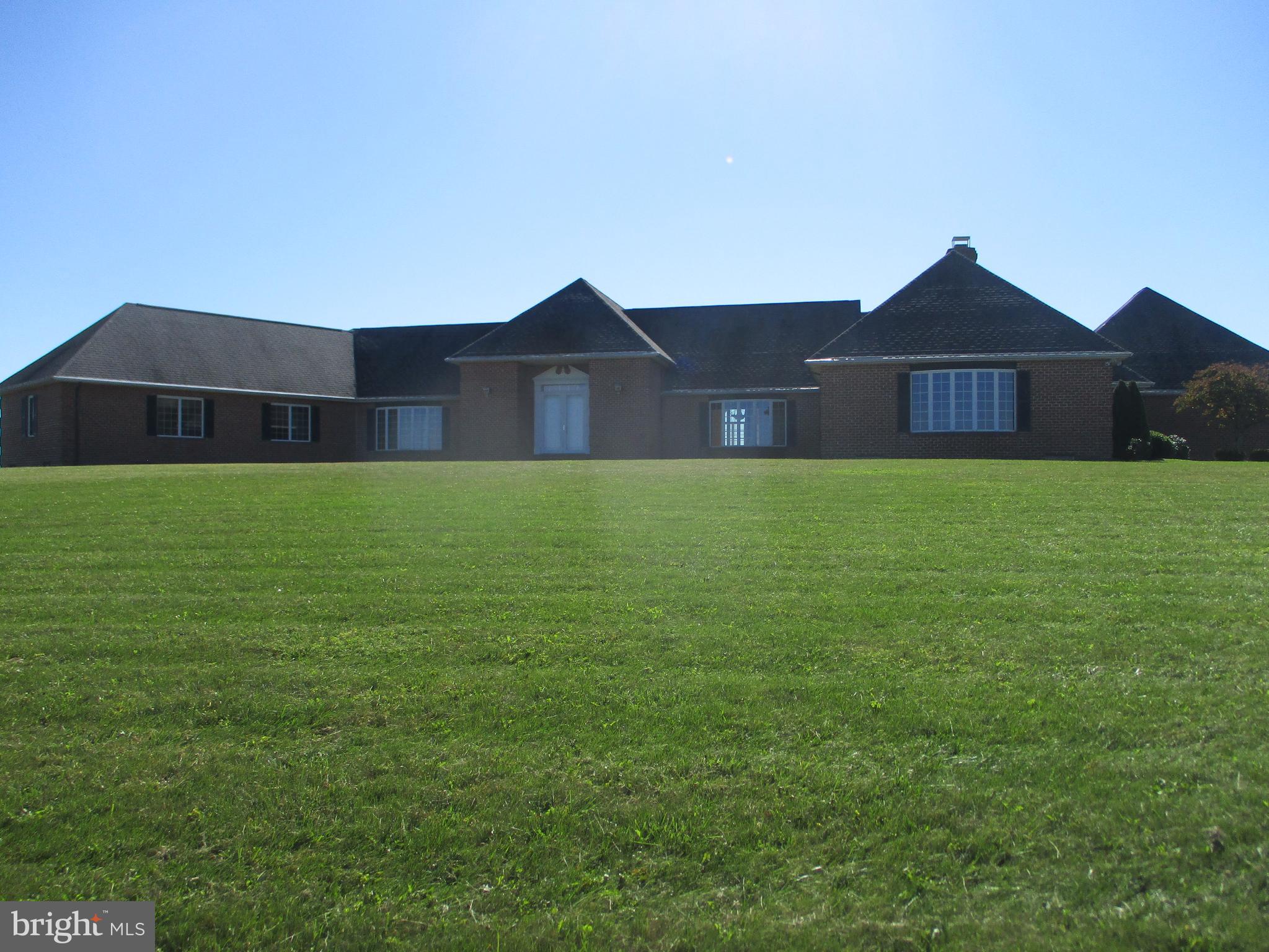 Unique luxury home on 23 acres with 360 degree views of Pleasant Valley. 5,100 + SQ. FT. 4 ensuite bedrooms, 2 additional powder rooms, formal living room/ballroom, informal living room, sunroom, den, pantry and large dine in kitchen. 4 fireplaces. full basement, 3 car attached garage. Whole home generator. Everything in this home is first rate. A must see for the discerning buyer