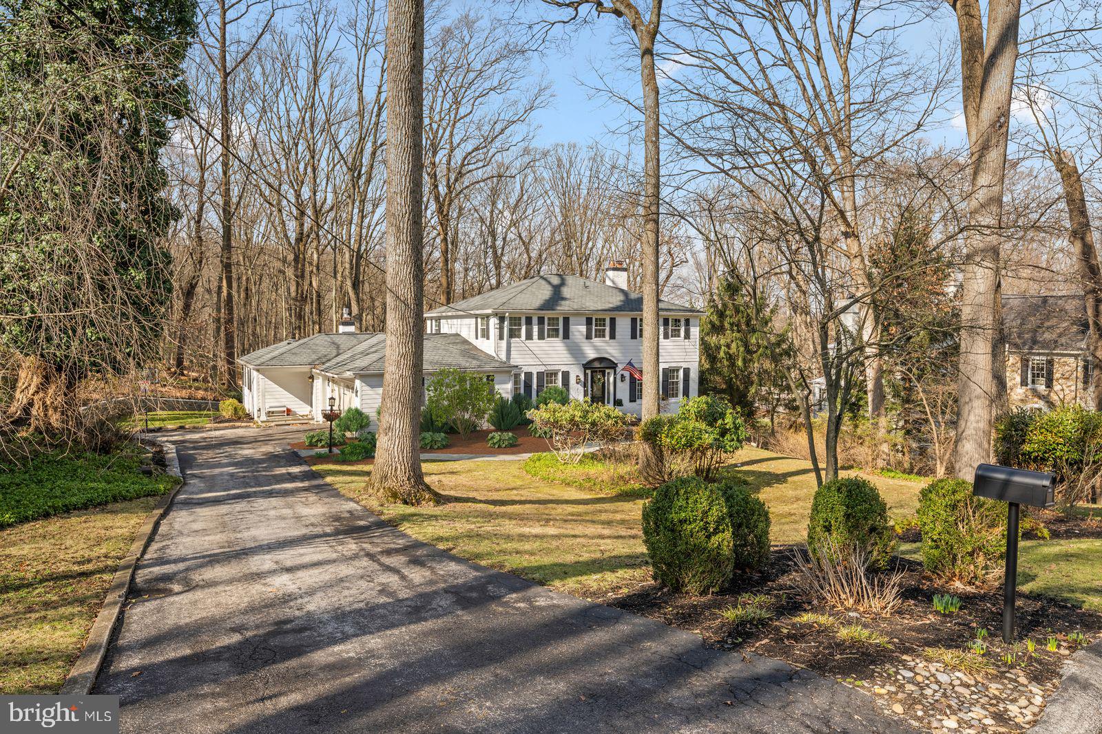 Tucked away on a quiet lane in the heart of Devon, 596 Tanglewood Lane offers a rare blend of privacy, elegance, and classic Main Line charm. Set on beautifully landscaped grounds, this exceptional residence welcomes you with a gracious approach and a sense of peaceful seclusion while remaining just minutes from the vibrant centers of Devon and Wayne. Stepping inside, gracious living spaces unfold with an effortless flow designed for both everyday living and elegant entertaining. Sunlit rooms, generous proportions, and timeless architectural details create an atmosphere that is both sophisticated and inviting. Expansive windows frame the surrounding greenery, bringing the beauty of the outdoors into nearly every corner of the home.

At the center of the home, the stunning gourmet kitchen opens up to a large family room for an inviting hub for daily life, as well as a breakfast room that opens seamlessly to an expansive wrap around deck overlooking the private backyard. Whether hosting summer gatherings or enjoying quiet evenings outdoors, the setting offers an effortless indoor-outdoor lifestyle.

A first-floor home office provides a private and quiet workspace—ideal for today’s flexible lifestyle—while a convenient first-floor laundry and mudroom add everyday practicality with thoughtful organization and easy access for busy households.

Upstairs, the large Primary suite offers a tranquil retreat. Enjoy two outfitted walk-in closets, gorgeous views of the private backyard, and a stunning Primary Bath Suite with walk in shower and large tub. 3 additional generously sized bedrooms complete the 2nd Floor and are serviced by a Hall Full Bathroom. 

The finished lower level offers flexibility for recreation, a home gym, playroom, or additional entertaining space with walkout access. Enjoy a spacious two-car attached garage that offers generous storage. The home is surrounded by mature trees and lush landscaping on approximately three-quarters of an acre. With its peaceful cul-de-sac setting, classic architectural character, and proximity to the Main Line’s most cherished amenities, 596 Tanglewood Lane offers a rare opportunity to experience refined suburban living in one of Devon’s most desirable neighborhoods.
