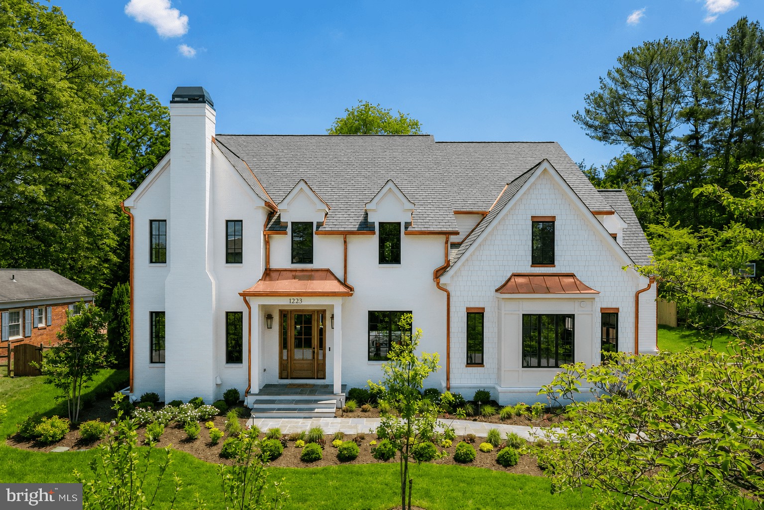 Welcome to 1223 Somerset Drive, an extraordinary new offering from Brush Arbor Home Construction  and designed by Wellhouse & Co. Sited on a flat half acre lot and spanning approximately 8,750 +/- square feet across three finished levels with 5 bedrooms upstairs and a shaft for an elevator to all levels.  This beautifully designed and exceptionally built home offers 6 bedrooms, 6 full bathrooms, 3 half bathrooms, with 3 car attached garage spaces, and an unparalleled level of detail for luxury living in Northern Virginia. Every detail of this home has been thoughtfully designed and curated to satisfy the most discerning buyer including copper gutters and roofing accents,  handsome brick masonry, multiple fireplaces, expandable Lutron lighting, security, and A/V systems installed by Sight and Sound. 

The main level opens with a graciously scaled foyer that draws the eye straight through the home toward the rear outdoor living spaces beyond. The formal dining room, anchored by a tray ceiling, sets an elegant tone for entertaining, while the adjacent library offers a quiet counterpoint to the home's more social spaces. At the heart of the home, the gourmet kitchen is a true showpiece designed by Studio 37 including all the quality and ascetic look the market has come to appreciate and expect from Brush Arbor Homes.  A fully equipped butler's pantry and secondary back kitchen ensure seamless hosting at any scale. The kitchen flows effortlessly into the Great Room creating the kind of open, connected living space that defines modern luxury. A light-filled breakfast room opens directly to the covered porches beyond, while a well-appointed mudroom connects the three-car garage as well as a second staircase to the second level.

The second level is anchored by a spacious primary suite complete with exceptional large walk-in closets,  and a spa like luxury bath. Four additional generously scaled bedrooms, each with its own walk-in closet and ensuite bathrooms, offer comfort and privacy for family and guests alike. A conveniently located laundry room rounds out the upper level with the thoughtful practicality this home delivers at every turn.

The lower level is designed for both entertaining and everyday living.  The recreation room is complemented by a stylish, modern bar with a waterfall island, a powder room, and bonus room with 10-foot ceilings that is pre-wired for a golf/sports simulator. A dedicated exercise room with backlit mirrors and space for a sauna is the perfect opportunity for someone committed to a wellness lifestyle.  A sixth bedroom with full bath and walk-in closet, and generous storage complete this level.

Outside, the home's rear living spaces are as refined as the interiors they extend.  A vaulted covered porch with gas fireplace, transitions seamlessly from the main living area of the home to the hard to find, at grade, fully fenced, flat rear yard.  Whether hosting an intimate dinner or a large gathering, the outdoor spaces offer a natural and elegant extension of the home.  Located just a few traffic lights to downtown McLean and Washington DC. Don't let this rare opportunity pass you by.