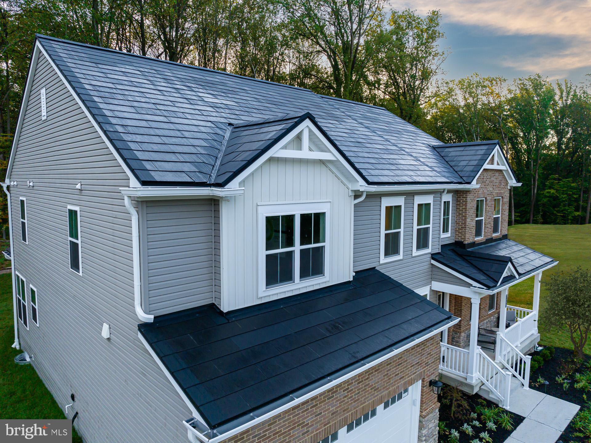 The Model home for the Hampton Hills community is now for sale!! Make this home yours today! With over 4,700 sq. ft. of living space the Willow is our largest floorplan. Enter your new home to a private study and dedicated dining room off the foyer, as well as a 1st-floor bedroom/bath and an open kitchen (with a walk-in pantry) that overlooks the breakfast area and great room! The 2nd-floor hosts a spacious loft, 3 secondary bedrooms, all with walk-in closets, and the luxurious primary suite with a spa-inspired bath. For additional room to play and unwind, finish the expansive basement, featuring a recreation room and another bedroom and full bath. Included Feature: TESLA Solar Panels on the roof – saving you money on energy bills! * Photos of similar home. *Pricing, features and, availability subject to change without notice. See a new Home Counselor for details. MHBR No. 93 2024 Beazer Homes.