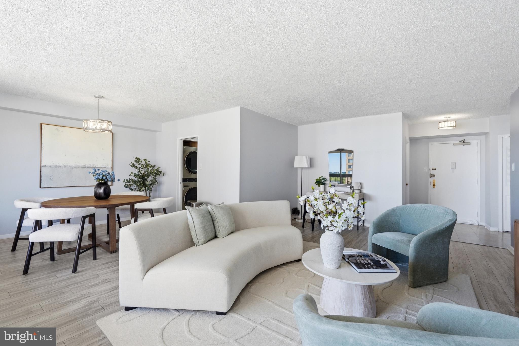 Don't miss this incredible opportunity to own a beautifully updated one-bedroom condo on the 12th floor, offering breathtaking views, abundant natural light, and a lifestyle of comfort and convenience.
The refreshed interior features stainless steel appliances, quartz countertops, luxury vinyl plank flooring throughout the main living areas, plush carpet in the bedroom, modern window treatments, and a tastefully renovated bathroom. An in-unit washer and dryer adds everyday convenience.
Step onto your private balcony to enjoy morning coffee or unwind in the evening while taking in views of the community pool and surrounding skyline.
Residents enjoy an exceptional lineup of amenities, including 24-hour concierge service with package acceptance, secure key-fob access, onsite maintenance, dedicated storage, a fitness center, sauna, party room, picnic areas, playgrounds, garage parking, and abundant guest parking.
Ideally located with easy access to major commuter routes and Metro, this home offers a seamless commute to Washington, D.C., and Maryland while placing you just minutes from premier shopping, dining, entertainment, and everyday essentials.
Whether you're a first-time buyer, investor, or looking to simplify your lifestyle, this move-in-ready condo offers the perfect combination of modern updates, exceptional amenities, and an unbeatable location.