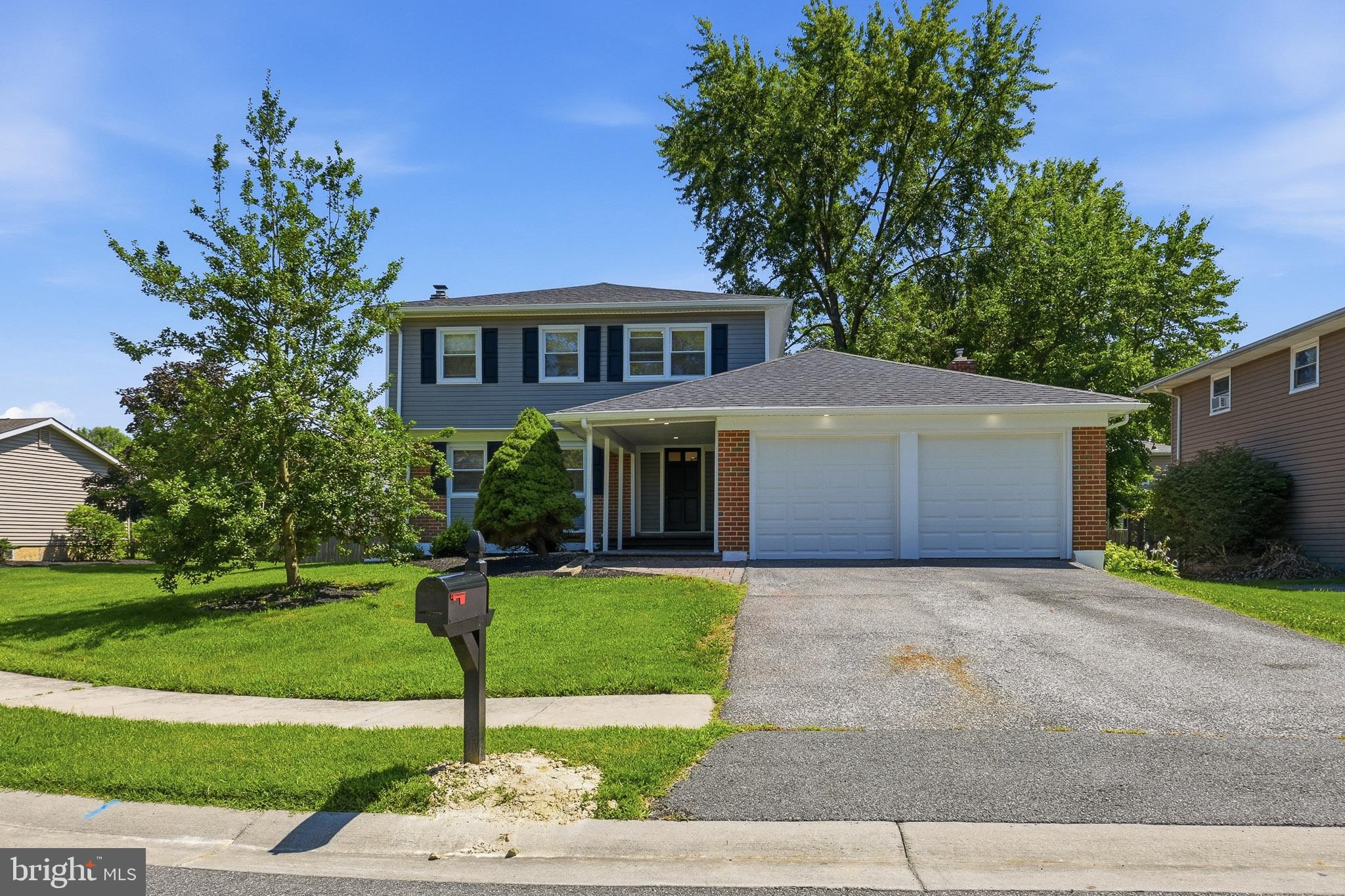Welcome to 8 Harvest Trail! This beautifully renovated 4-bedroom, 2.5-bath Colonial in the desirable Four Seasons community is truly move-in ready. A charming covered front porch welcomes you into a thoughtfully designed floor plan featuring formal living and dining rooms, plus an open-concept kitchen and family room that’s perfect for everyday living and entertaining. The stunning kitchen boasts custom soft-close white cabinetry, quartz countertops, stainless steel appliances, and opens seamlessly to the family room with a cozy electric fireplace. A sliding glass door leads to a large rear deck, creating the perfect space for outdoor dining, entertaining, or simply enjoying the spacious backyard. The first floor is finished with new luxury vinyl plank flooring and fresh paint throughout, while a convenient first-floor laundry room and powder room are located just off the attached 2-car garage.

Upstairs, you’ll find four spacious bedrooms, including a generous primary suite with two large closets and a private en-suite bath. Three additional bedrooms share an updated hall bathroom. The second floor features brand-new carpet and fresh paint, giving every room a clean, modern feel. The partially finished basement adds approximately 400 square feet of additional living space and also features new luxury vinyl plank flooring, making it ideal for a recreation room, home office, gym, or playroom.

Major updates include a new roof, new siding, new soffit, new fascia, new gutters, new windows, updated electrical and plumbing, new HVAC system, new hot water heater, and a completely remodeled kitchen.

Outside, enjoy a generously sized backyard with plenty of room for entertaining, recreation, or gardening. Located in the sought-after Four Seasons neighborhood with access to a community pool, this home is just minutes from Route 896, I-95, Route 40, the University of Delaware, Christiana Hospital, Christiana Mall, shopping, dining, and more. Offering the style, quality, and peace of mind of a nearly new home, this is one you won’t want to miss.