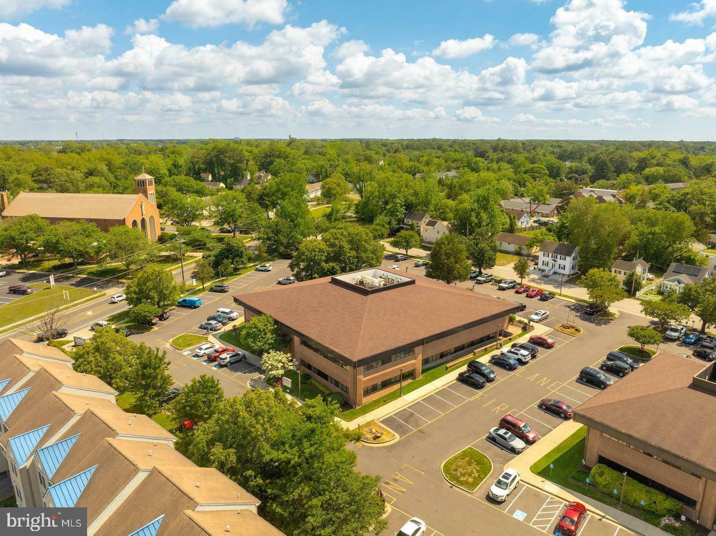 Unit A201 - 2,018 sq.ft. Turnkey professional office space.  All new LED lighting  Offers front waiting and receptionist area, large executive office and private  offices,  (former exam rooms), conference room, in-suite restrooms, former surgery suite, kitchenette and plentiful storage areas.  Large windows for natural light.  2 entrances to allow for added privacy.  Alarm and camera system.  Upgrades in a new roof, new parking lot, several sidewalk replacements, downspout/gutter and drainage improvements, and a new fire sprinkler system. They are also currently working on installing an access control system at each main entry.