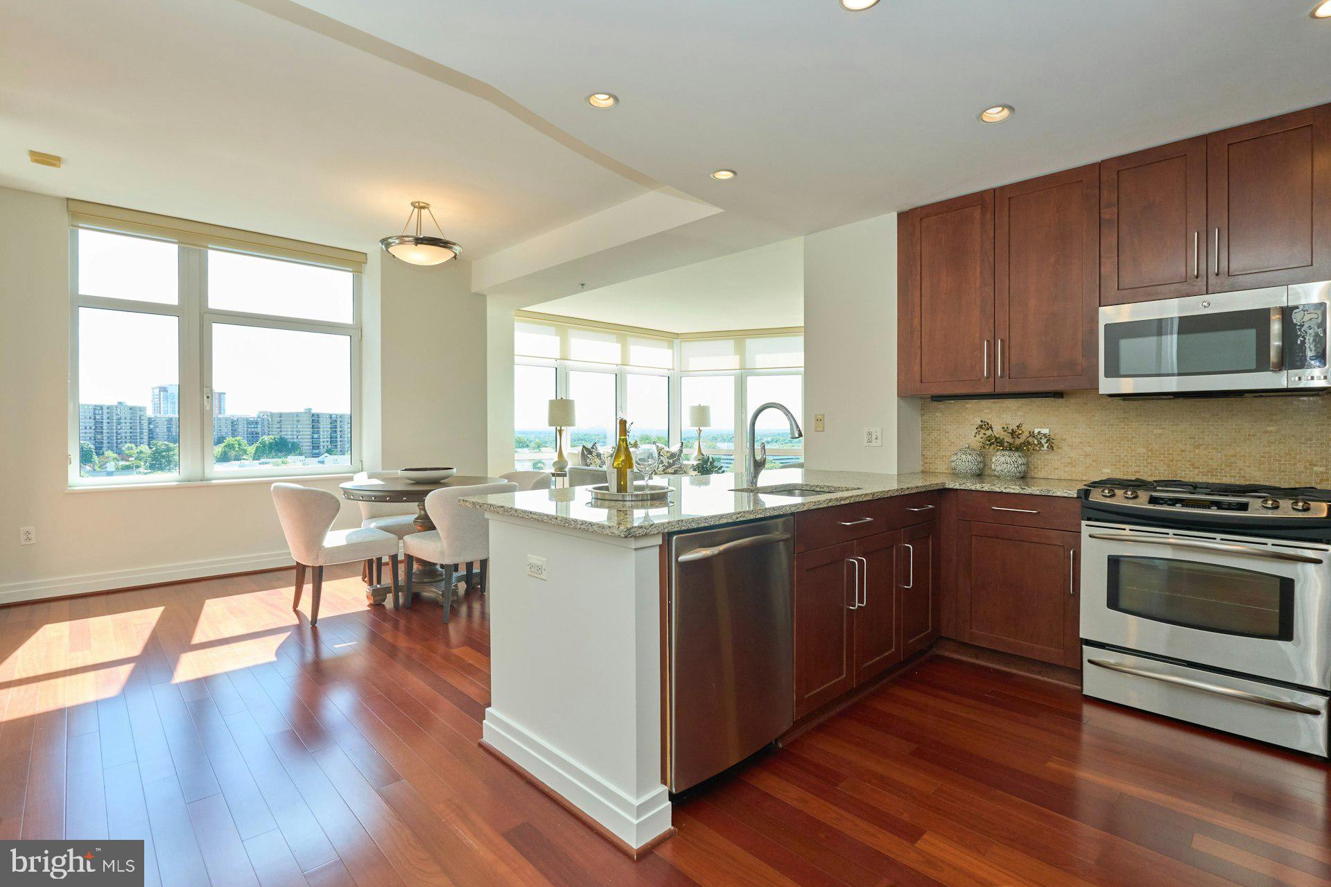 Remarkable! Park Crest Condominium is a 19 story tower soaring above Tysons Corner. This great opportunity is located in a hub of entertainment, shopping & international business in Tysons Corner, 15 minutes from Dulles International Airport, National Airport & downtown DC.  Boasts beautiful corner views and light and bright layout!  One Park Crest is the pinnacle of luxury offering a private gym for residents, party room, roof top pool.  The central location to Tysons and DC makes this a great place to call home!  Convenient Harris Teeter location next door!  Tucked away from main roads yet close to all the fun activities!    Truly a rare gem!