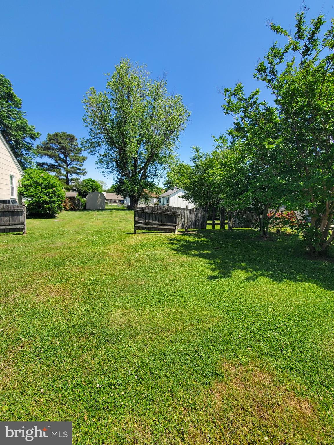 This well-maintained, lush residential lot offers the ideal place to build your new home.  PRICED BELOW ASSESSED VALUE to give you the best value!  A 'welcome gate' and fence is fronted with crepe myrtle trees and a beautiful rose bush.  Plenty of cleared space from a previous house has been maintained for a newly constructed home, as well as more open area in the rear of the lot.  Yard is surrounded by neighboring fences.  And, a mature tree offers shade for relaxing in the backyard.    *Two existing storage sheds will be removed prior to settlement. 
Buyers and their agents to do due diligence regarding property size, boundaries, and city requirements for building and connections.