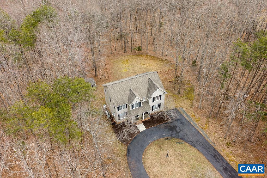 New Price! Welcome to 665 Fox Hollow Lane in Palmyra?custom-built, spacious, and thoughtfully designed with no HOA. This 6-bedroom, 3.5-bath home offers flexibility for today?s lifestyle. The main level features a large great room with gas fireplace, formal dining room, home office, and an eat-in kitchen that opens to a rear deck?ideal for entertaining or relaxing outdoors. A main-level bedroom and full bath provide excellent space for guests or multigenerational living. Upstairs, the primary suite includes a private bath with jetted tub and office nook. Three additional bedrooms, a full hall bath, and convenient laundry complete the second level. The finished basement offers expanded living options with a large recreation area, additional bedroom, storage, finished half bath, and a framed full bath rough-in. Potential for a kitchenette and separate living space adds even more versatility. Recent improvements include a washer and dryer in 2022, Septic pumped in 2024, water softener and filter system installed in 2022 and more! Set on a large yard with no HOA restrictions, this home combines space, function, and comfort in a desirable Palmyra location.,Formica Counter,Wood Cabinets,Fireplace in Great Room
