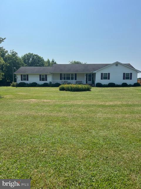 Meticulously maintained three bedroom 2.5 bath home situated on 2.46 acres in the country, but close to town. Well built by the contractor for his own primary residence. He didn't cut corners on quality of workmanship. This is a spacious home on a spacious lot. Open floor plan from entry to family room, dining room and kitchen with a private living room.  Attached two car garage allows you to enter the house out of the weather and into the utility room with a half bath. There is an additional oversized one car detached garage that allows for work space, or hobby room or whatever you would like it to be. Property in fenced with a privacy fence on the north side and a privacy fence and cattle fence across the western perimeter of the property. The grounds are landscaped with mature trees and boasts approximately two acres of lawn area that could be used for many things maybe a truck garden, horse pasture or something else.
This is a lovingly maintained property that will not last long. Call today for your private showing!
