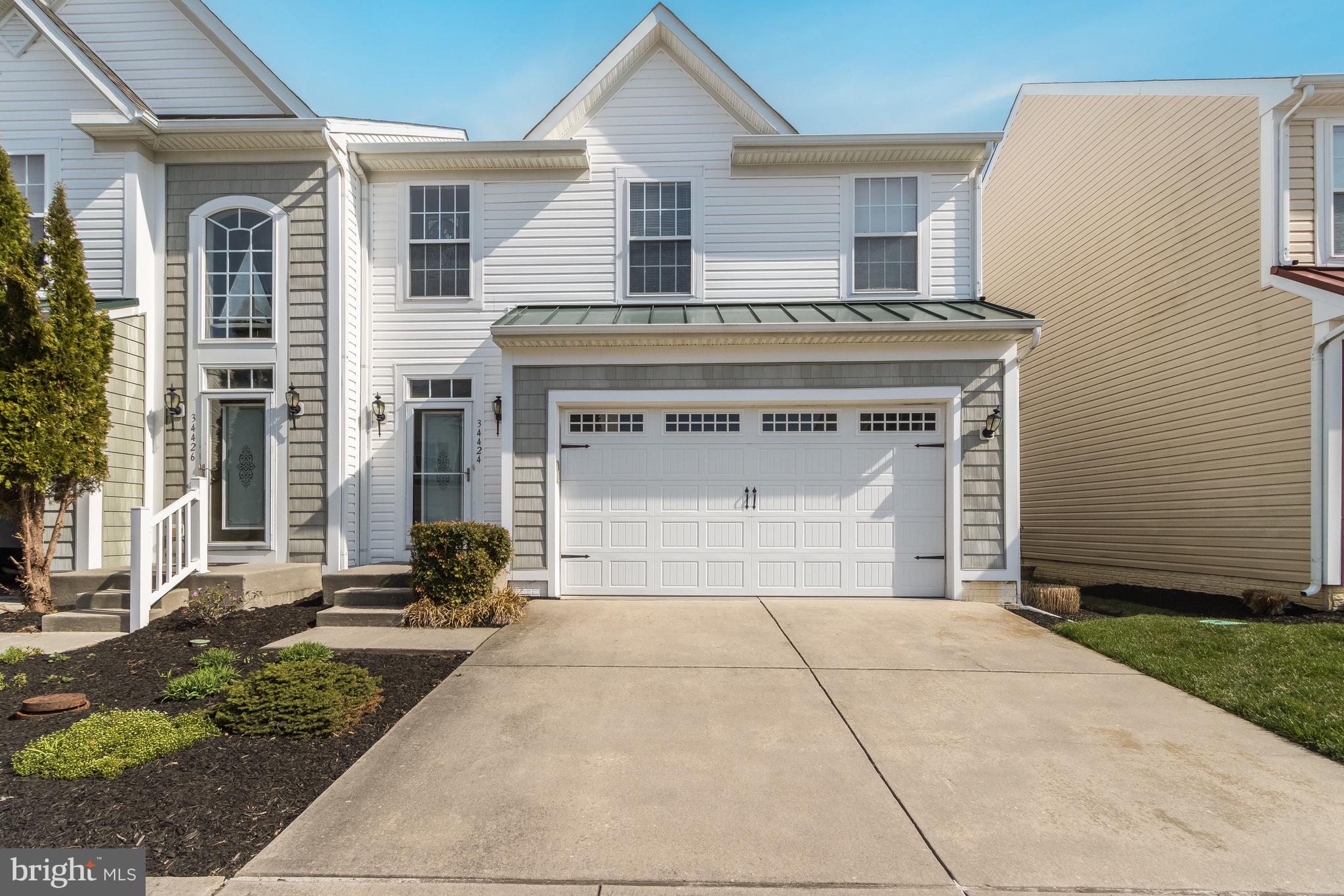Bike to the Beach, walk to the Pool - The Beach Life Awaits @ Sterling Crossing w/Community Pool & Fitness Center.  One of a kind 4BR, 2.5 BA Carriage Home w/FP,  Screen Porch, 2 Car Garage, 1st Floor Primary Suite w/walk-in closet & 2nd floor w/spacious loft plus 3BR's & Bath.  Offering lots of Storage - 43x27ft full basement w/egress window plus 2 Car Garage (only 1 of 4 homes built in Sterling Crossing has a 2 car garage).  Enjoy Sunrises from your Screen Porch backing to open space &  Cozy evenings by the fire.  Love sharing this spacious beach home or renting it (min. 1 mo rental).  Rents for $16K+ for Summer Season or $2200-2500/mo year round.   Never rented, Beautifully kept as a 2nd home.  Offered Fully Furnished including beach chairs.