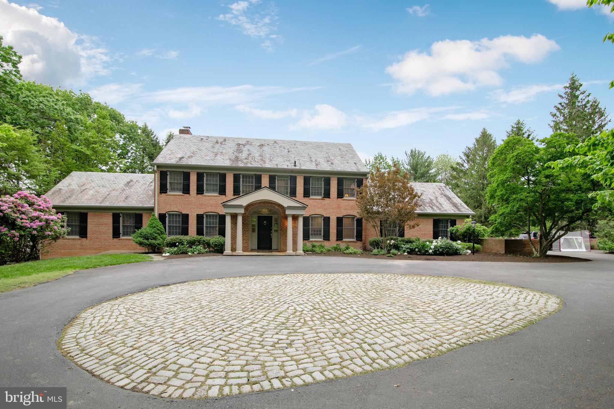 Inviting Potomac Falls home on 2+ glorious acres of lush sweeping lawns of the most desirable lot which cradles a well-proportioned home with over 5600 SqFt of finished space... greenhouse and more! Gorgeous courtyard entrance to foyer and lots of light throughout home. Main level master suite w/Library. 5 bedrooms on second level including private guest room & huge playroom. Tranquil baths and powder rooms. Lots of counterspace in kitchen.  Fabulous, Lower-Level Recreation Room opens to charming Loggia for entertaining beside beautiful, self-cleaning pool. This home has it all!!! Separate staircase for In-Law/Au Pair Suite/Home Office. Easy access to Clara Barton Pkwy, Great Fall Park, C&O Canal!