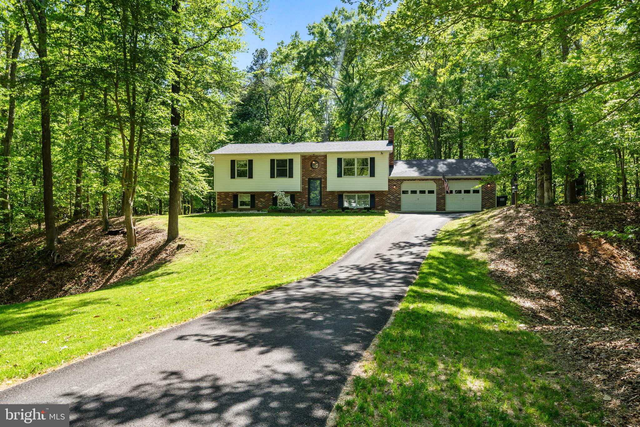 Welcome to your dream home, where comfort meets style in the heart of Mechanicsville! This beautifully remodeled detached split foyer offers 4 bedrooms and 2 fully renovated bathrooms across a generous 2080 square feet. Step inside to discover brand new carpets gracing all bedrooms and stairs, complemented by new flooring in the common areas. The stunning renovated kitchen with shiplap accents sets the perfect stage for culinary creativity. The dining room features elegant shaker wainscoting, adding a touch of sophistication to your family gatherings.



Outside, you'll find the best of both worlds—a private setting nestled within the established Country Lakes neighborhood, offering tranquility and convenience. Enjoy gatherings on the large deck that overlooks a peaceful backyard or toast marshmallows around the fire pit. The newly paved driveway and oversized two-car garage enhance both functionality and curb appeal.



Situated on just over an acre of land, this property is your personal oasis, centrally located yet offering the serenity you crave. Schedule a tour today and discover why this home is the perfect setting for your family’s future memories.