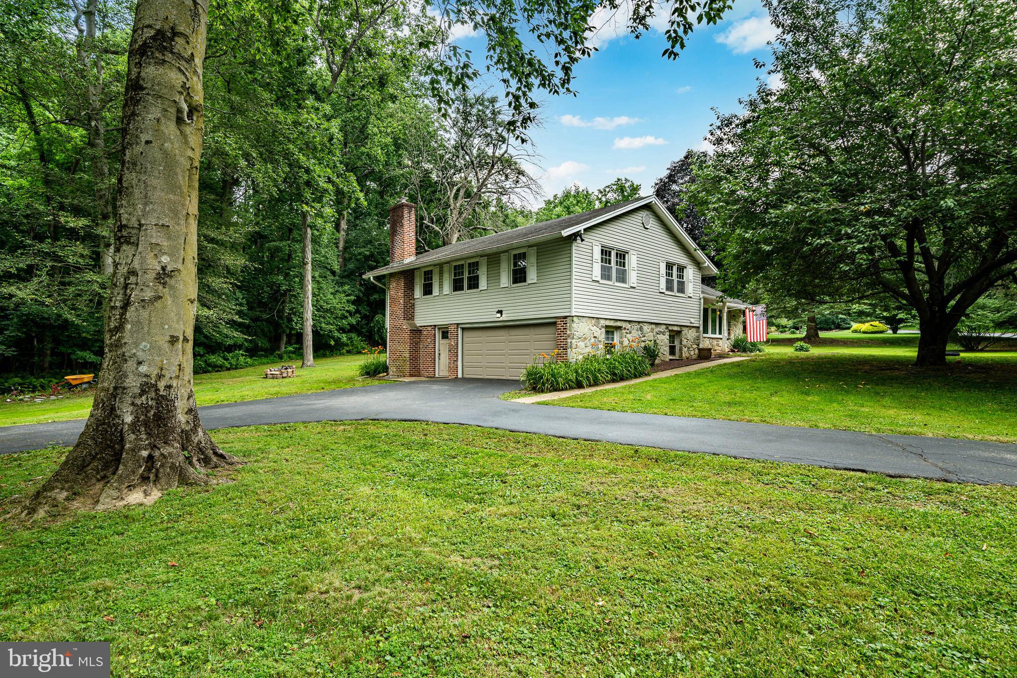 Welcome to this beautifully maintained 4-bedroom, 3 full bath single-family home nestled on just over one picturesque acre in the highly sought-after Pickering Estates community of Chester Springs. Located within the award-winning Downingtown Area School District, this exceptional property offers the perfect combination of space, comfort, and convenience.  Step inside to discover a thoughtfully designed floor plan featuring four generously sized bedrooms, including a spacious primary suite complete with a private ensuite bath. The recently added third full bathroom on the lower level provides added flexibility, making the finished basement an ideal space for guests, a recreation room, home office, or multigenerational living.  Enjoy peaceful mornings or relaxing evenings in the charming three-season room overlooking the tranquil backyard. Outside, the private patio and expansive yard offer the perfect setting for entertaining, outdoor dining, gardening, or simply enjoying the beauty and privacy of the surrounding landscape.  Perfectly positioned just minutes from the Pennsylvania Turnpike, this home provides easy access for commuters while remaining close to the exceptional shopping, dining, parks, and everyday conveniences that make Chester Springs one of Chester County's most desirable places to call home.  Offering over an acre of beautiful outdoor space, a desirable neighborhood setting, and an unbeatable location within the Downingtown Area School District, this is a wonderful opportunity to enjoy everything Chester Springs has to offer. Schedule your private showing today!