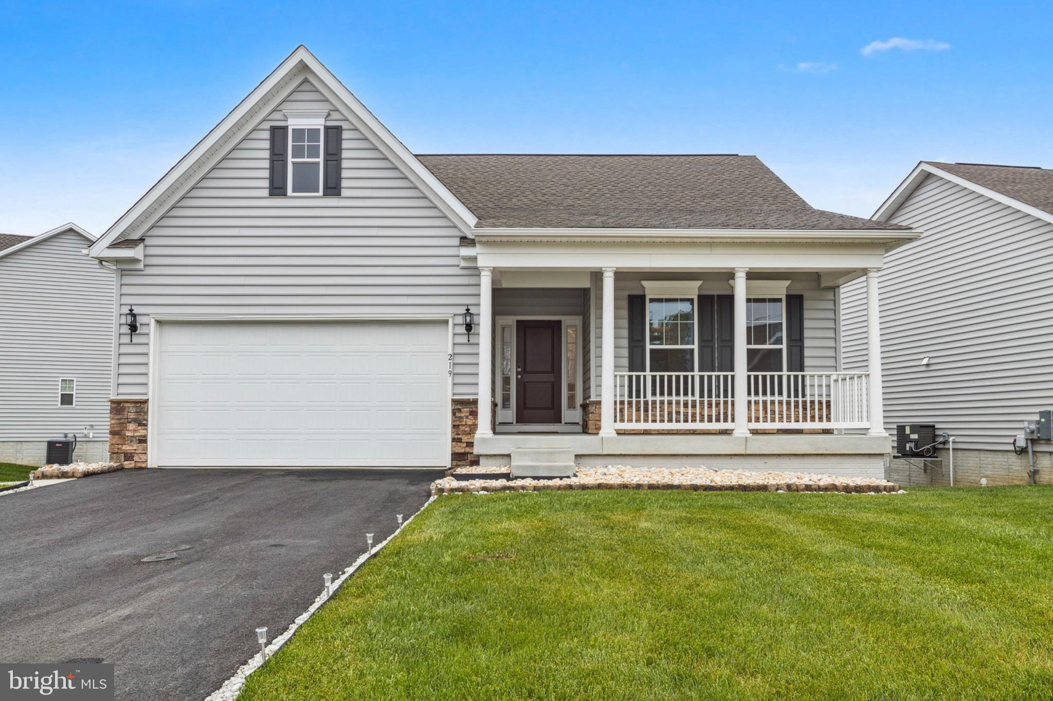 Welcome to 219 N Heron Circle, nestled in the sought-after 55+ community of Riverbend at Old New Castle. Built in 2022, this beautifully designed ranch-style home offers over 2,300 square feet of thoughtfully crafted living space, including a finished basement perfect for guests, hobbies, or extra entertaining room. With 3 spacious bedrooms and 3 full bathrooms, this home blends comfort and convenience at every turn. The kitchen is a true standout, featuring elegant quartz countertops and sleek finishes, while the open-concept layout is enhanced by stylish lap flooring. Step outside to enjoy your private deck and fully fenced backyard—ideal for quiet mornings or lively gatherings. The two-car garage is upgraded with an epoxy floor and utility sink, combining function with flair. Community living is effortless with a $195 monthly HOA that includes lawn care, trash removal, snow clearing, annual mulching, and access to top-tier amenities like the clubhouse, indoor pool and hot tub, fitness center, walking trails, and more—all just steps from the scenic water. If you’re looking for low-maintenance luxury in a vibrant, active community, this is the one to call home.