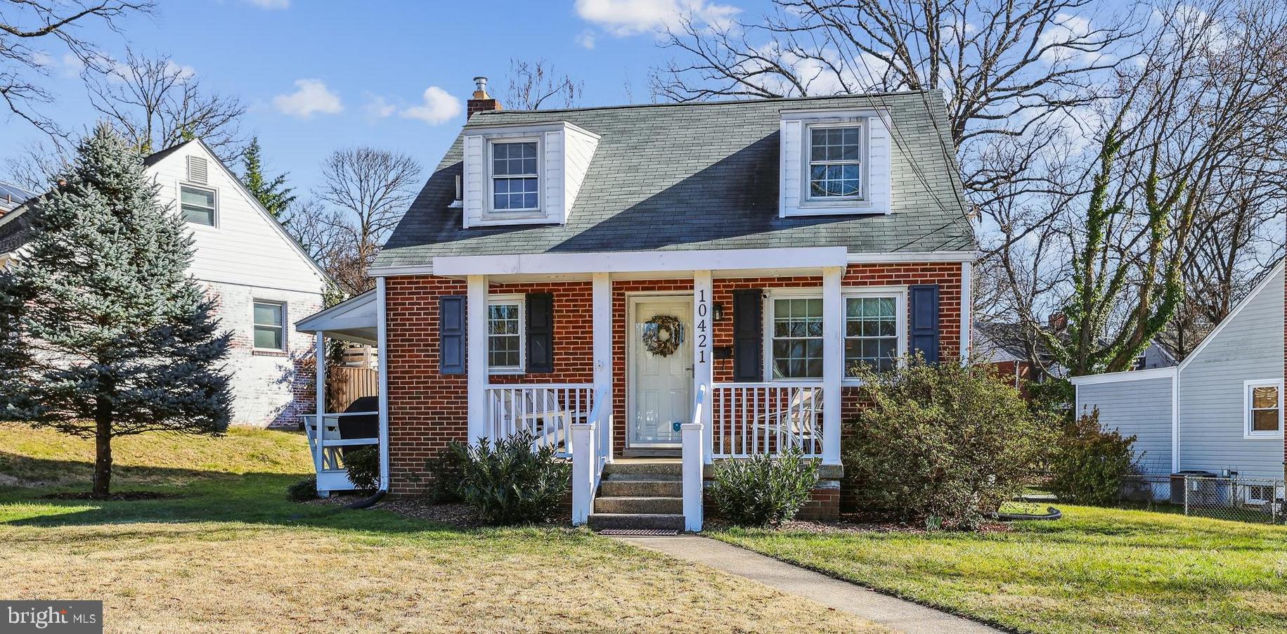 FIRST OPEN on Sunday, 2/18 from 1-4pm!  Welcome to 10421 Grandin Rd, a charming cape cod with three finished levels.  Welcomed by a covered front porch, the main level features a spacious Living Room, Dining Room, Kitchen, as well as a Bedroom and full Bathroom!  In this floorplan, the 3rd Bedroom has been converted to a Dining Room, but could easily be converted back (there is already a closet!) by simply adding one wall.  The giant Primary Bedroom takes up the entire Upper Level.  Complete with ample closet and storage space, room for a desk, and temp controlled by separate mini-split system.  The finished Lower Level offers a large Rec Room with additional office/work space.  Separate Laundry/Utility room and tons of storage space!  The main level walks out to a covered side porch with built-in bench, flowing to the backyard with a patio and shed.  Less than 1.5 miles to both Wheaton-Glenmont and Forest Glen Metro stops, with easy access to Georgia Ave and I-495.