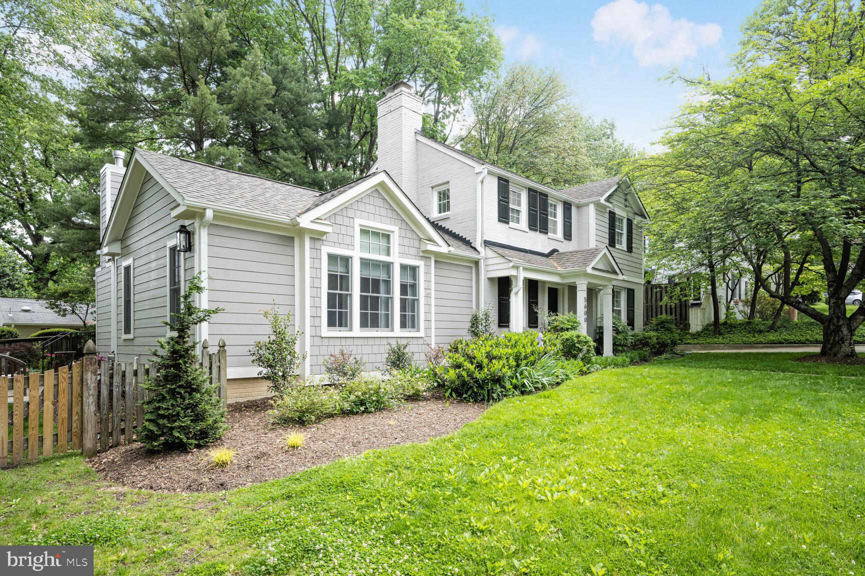 Welcome to 5600 Vernon Place - a thoughtfully expanded, meticulously maintained home just minutes from the heart of Bethesda. This beautifully updated property offers the ease of one-level living paired with modern spaces designed for both comfort and style.

The recently added, light-filled family room flows effortlessly into the open-concept kitchen and dining area—an ideal layout for both everyday living and effortless entertaining.

The main level features a flexible and private suite complete with a walk-in closet, elegant full bathroom, and its own laundry - perfect as a primary bedroom, guest retreat, or in-law space. Upstairs, you'll find a second primary suite, three additional bedrooms, and another full bath—plenty of room for family, guests, or a home office.

The fully finished basement adds even more living space, with a rec room, ample storage, a newly added full bath, and a second laundry area. Custom window treatments throughout the home add a polished, designer touch.

Outside, enjoy mature landscaping and a convenient patio for grilling. The oversized, attached one-car garage offers everyday practicality with just a half step into the mudroom leading to the house. Nestled in the Bradley Hills neighborhood, you're just a short stroll to downtown Bethesda via a neighborhood path. You will enjoy easy access to parks, dining, shopping, and Montgomery County public schools. Move right in and experience the perfect blend of timeless charm and modern comfort.