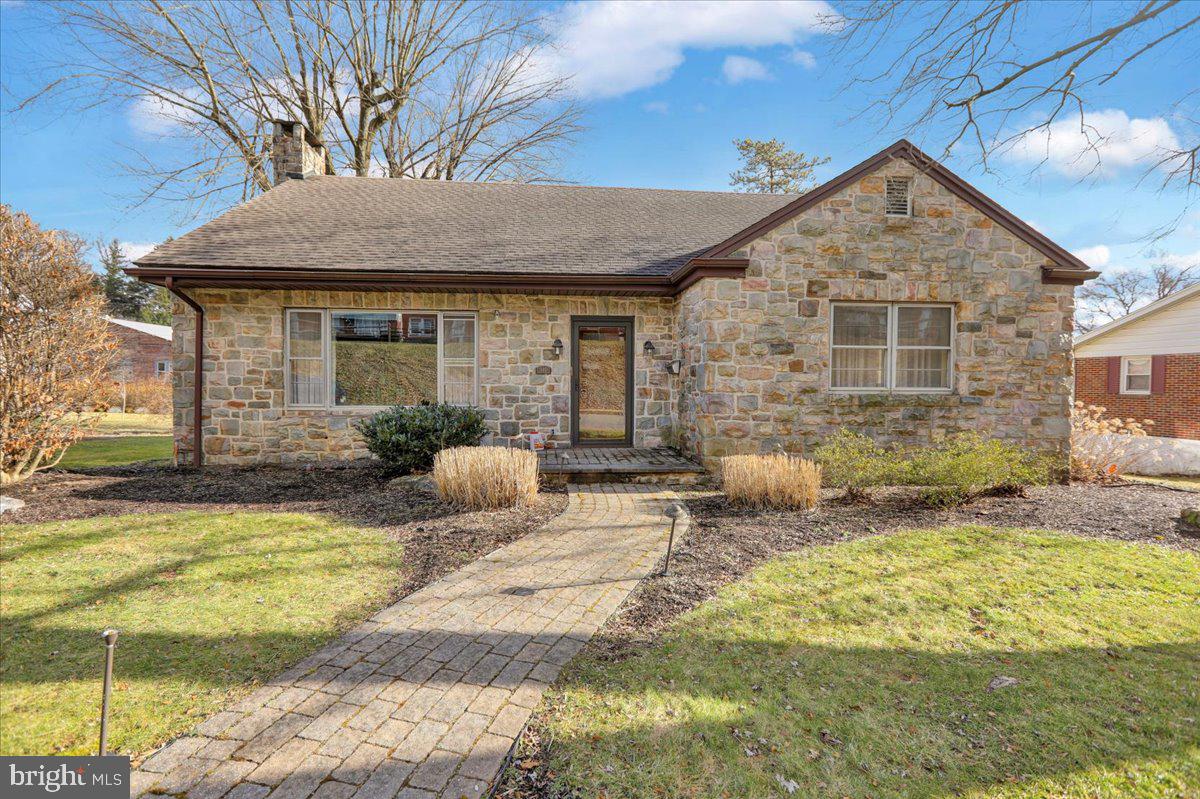 Consider this charming four-bedroom solid stone cape style home located in Kutztown Area Schools in your home search.  As you enter, the main floor offers a large living room accented with a stone gas fireplace with mantel, formal dining room, renovated kitchen with center island, stainless steel appliances and recessed lighting. Main floor also includes two bedrooms and full bath. Upstairs you will find an additional two bedrooms and 2nd full bath. The finished portion of the basement provides a great space to enjoy with family and friends. This additional living space that features a wood burning corner fireplace can be used for a variety of uses including family or rec room. There is a two-car detached garage providing ample space for parking and storage as well as nice covered rear porch. Don't miss the opportunity to make this house your home. Call for more info.