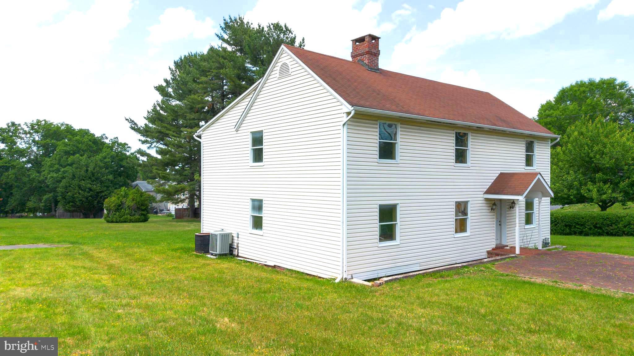 A rare opportunity awaits with this unique property offering a total of 2.58 acres across two adjoining parcels, including the homesite and the additional lot located directly behind it. Bring your rehabbers, lovers of homes that need TLC, and all your buyers that want to fix up a home and give this one new life.  Whether you're seeking extra privacy, room to expand, or exploring future investment potential, this expansive offering provides endless possibilities. The additional acreage creates a picturesque setting while offering flexibility for a variety of uses. Buyers and agents are encouraged to perform their own due diligence with the county regarding subdivision potential, permitted uses, and any future development opportunities. Bring your masks and sneakers! Please don't bring anyone into the home under the age of 18. There could be mold and microbial growth and other fun things once inside.