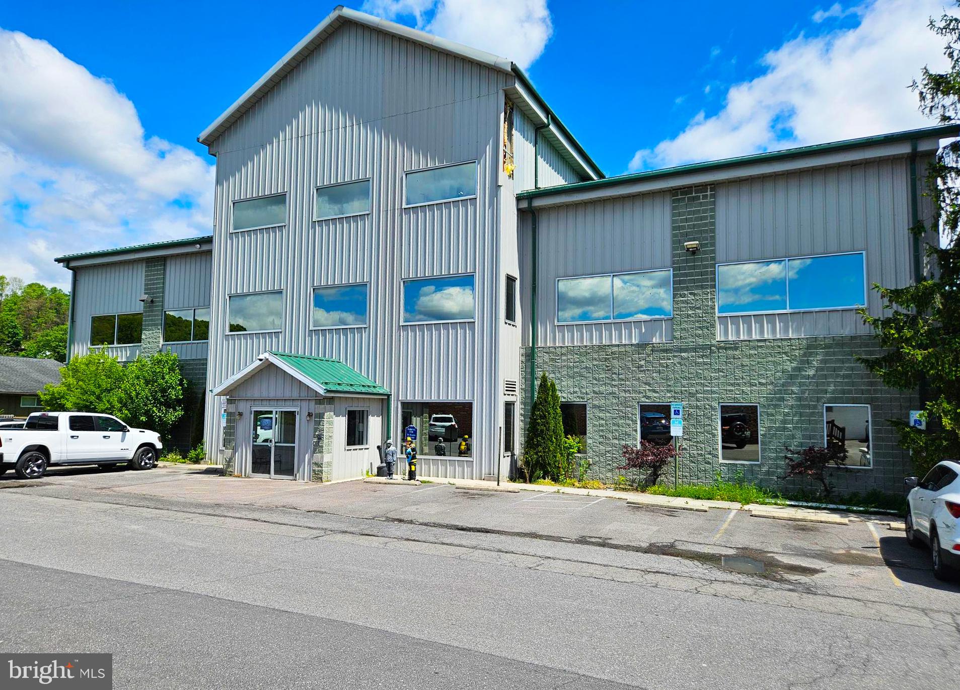 Two story medical office building with a loft • Formerly multi-tenanted • Elevator served • Built in 2004, brick and pre-engineered metal facade • Roof - Standing seam metal • Large, coated steel pylon signage
• Excellent visibility and access fronting National Highway in LaVale • Heat - Gas York system • Cooling - York condensers