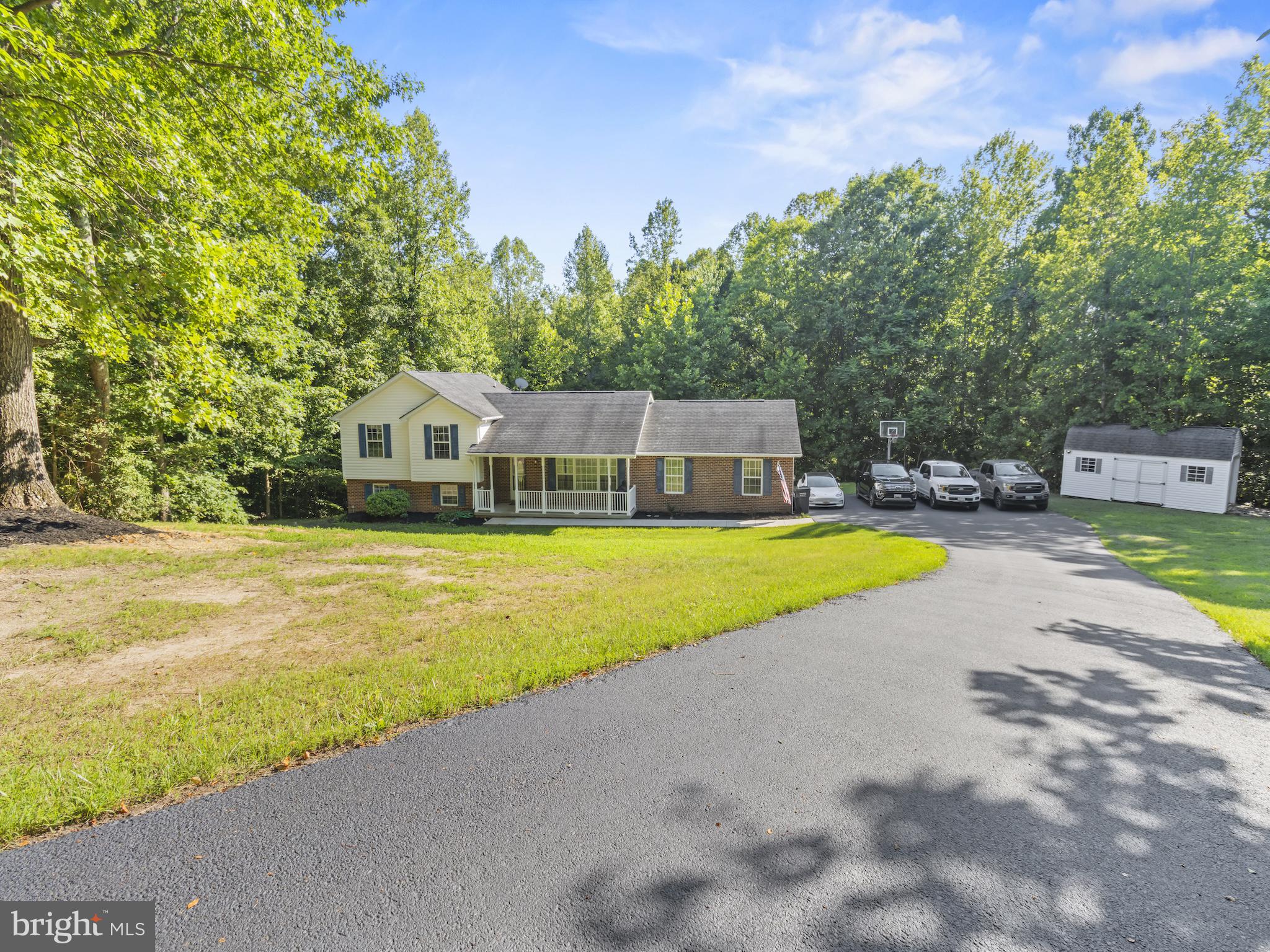 Tucked away at the end of a quiet cul-de-sac, this spacious 4-bedroom, 3 full bath, 1 half bath home offers over 2,800 square feet of living space on 3.39 private wooded acres. One of the property's most unique features is that it backs directly to a large, forested area recently acquired state-owned land, with plans to be for public use providing easy access to enjoy nature right from your backyard. No HOA either.

With its peaceful setting, the home is conveniently located just minutes from Charlotte Hall, offering quick access to shopping, dining, schools, and everyday conveniences.

Inside, you'll find a flexible floor plan with two primary suites—one on the main level and one upstairs. The home also features a spacious living room, dining area, well-appointed kitchen, dedicated laundry room, and a unique recreation room complete with a built-in aquarium that creates a true conversation piece.

Recent improvements include a replaced well pump and upgraded water pressure system, providing peace of mind for years to come.

Outside, you'll appreciate the privacy provided by mature trees, abundant parking, a large level side yard perfect for additional storage, recreational vehicles, or future improvements, and a storage shed for your tools and equipment.

If you've been searching for a home that combines privacy, space, convenience, and direct access to the outdoors, this one is a must-see!