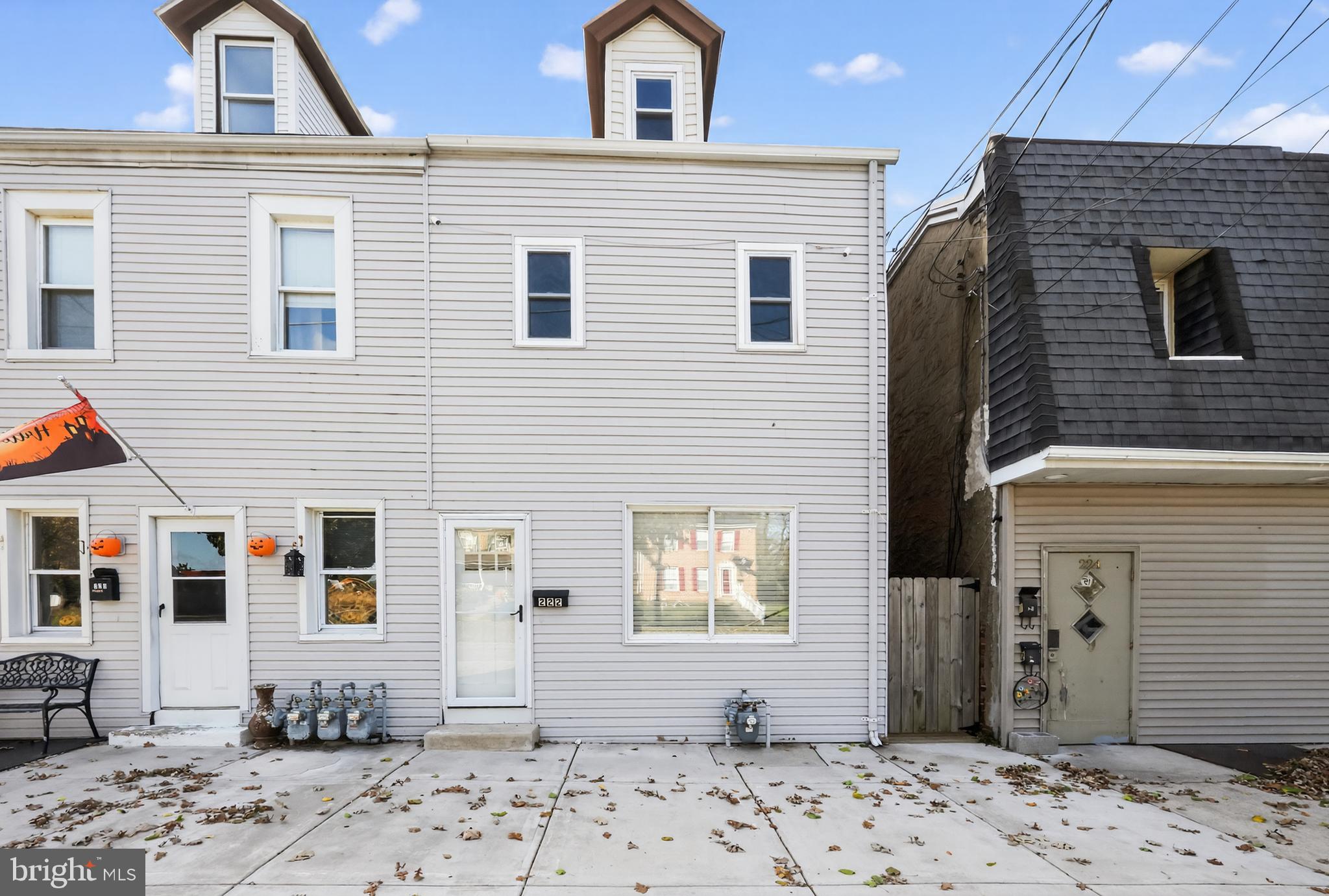 Welcome to 222 Market Street – a charming twin colonial located in the heart of Marcus Hook! This well-maintained 4-bedroom, 1-bath home offers 1,792 square feet of comfortable living space across three levels, combining classic character with modern updates. From the moment you step inside, you’ll appreciate the natural light that fills each room and the thoughtful layout that makes this home both inviting and functional. The spacious living room is designed for relaxation and everyday living, featuring multiple windows, a ceiling fan, a wood accent wall, and a TV mount ready for your entertainment setup. Just beyond, the dining room sits conveniently between the living room and kitchen, perfect for hosting dinners or casual family meals, and offers direct access to the backyard. The kitchen boasts warm oak cabinetry, plenty of counter space for meal prep, and another ceiling fan for comfort. Upstairs, the second level features three well-sized bedrooms, each with adequate closet space and overhead lighting. The primary bedroom stands out with soft carpeting and a large closet, while the updated hall bath features a stylish tub/shower combo and durable LVP flooring. The third bedroom on this level is accessed through the second bedroom. It can also serve as a home office, nursery, or walk-in closet! On the third floor, you’ll find a spacious fourth bedroom with great privacy, ideal for guests or a quiet retreat. The basement provides a dedicated laundry area and additional space for storage or hobbies. Outside, the yard includes a ground-level deck, offering a great spot for barbecues, outdoor dining, or simply relaxing in the fresh air. Street parking is available right in front of the home for your convenience. This property is just minutes from local restaurants, shopping, and major highways, making commuting or exploring the area a breeze. 222 Market Street offers comfort, character, and convenience, all in one inviting package. Schedule your showing today and see why this home is a wonderful place to call your own!
